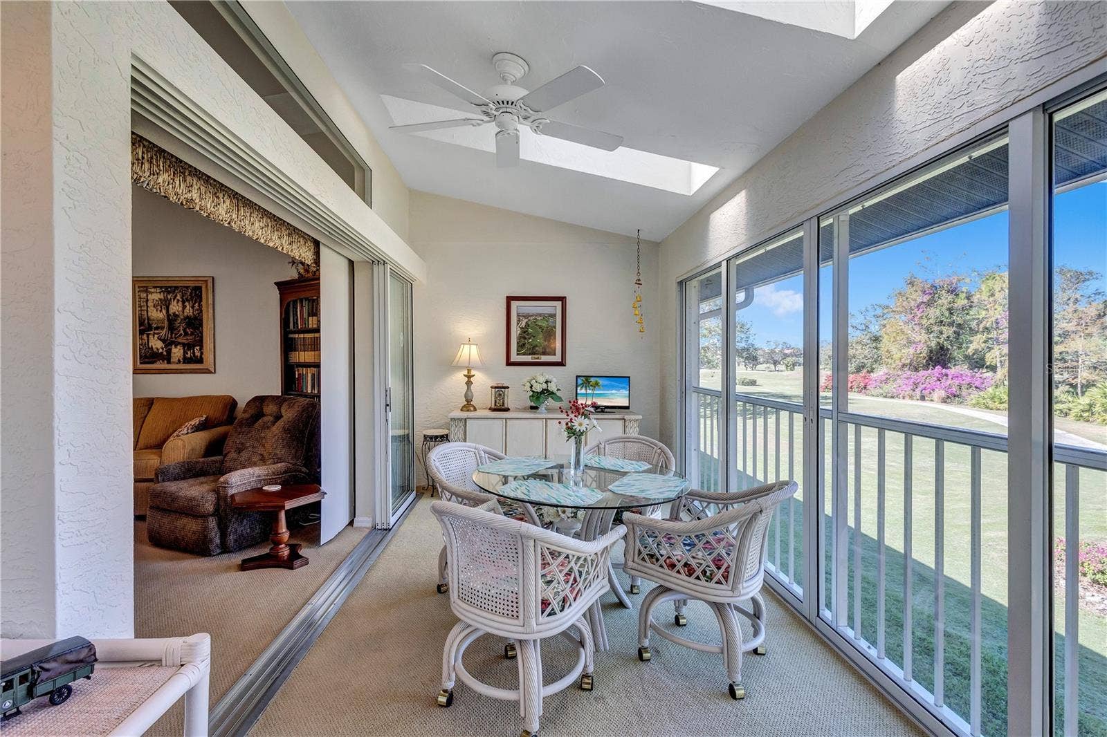 6713 STONE RIVER ROAD, #205, Bradenton, FL 34203 Bright and Cheery Skylit Back Lanai