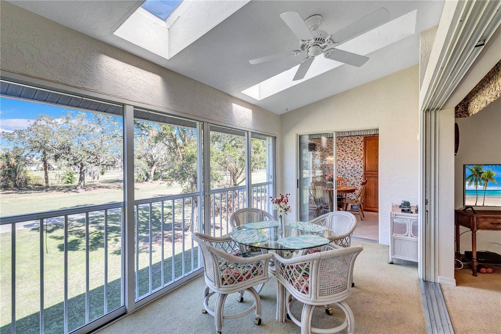 6713 STONE RIVER ROAD, #205, Bradenton, FL 34203 Bright and Cheery Skylit Back Lanai with grand view of the Fairway