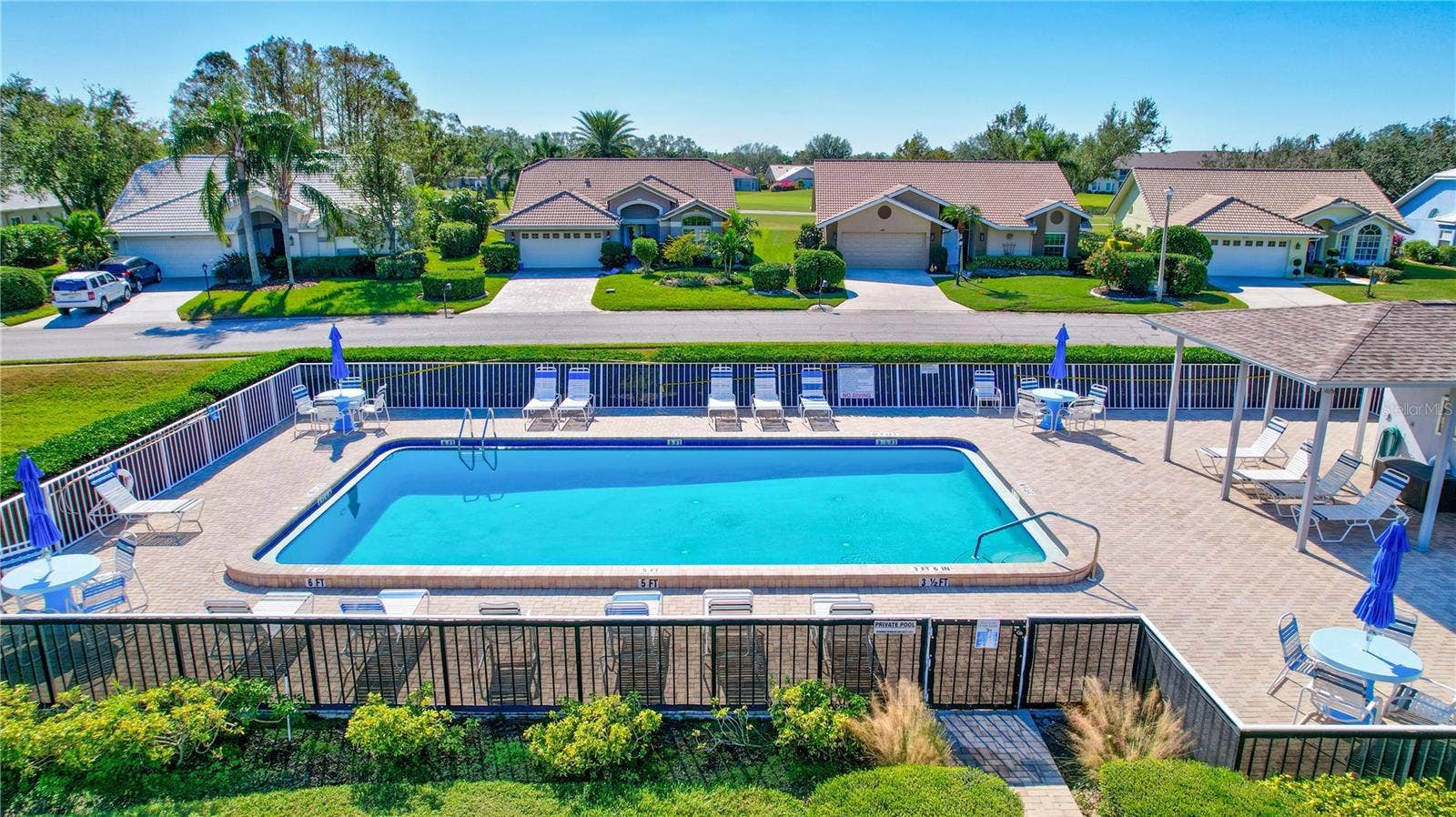 6713 STONE RIVER ROAD, #205, Bradenton, FL 34203 Heated Community Pool