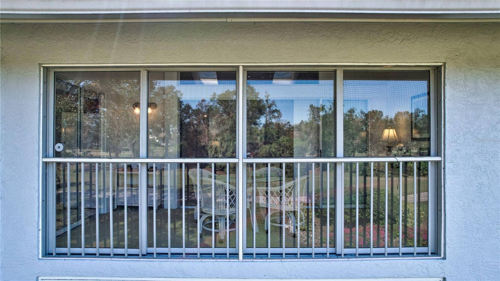 6713 STONE RIVER ROAD, #205, Bradenton, FL 34203 Back Lanai facing the Fairway