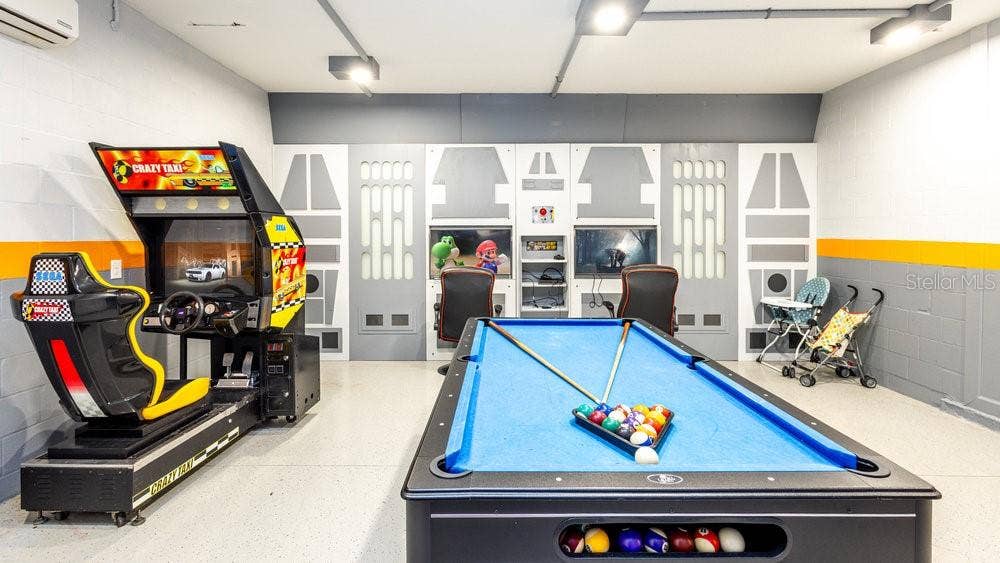 1450 ROLLING FAIRWAY DRIVE, Davenport, FL 33896 Game Room Garage