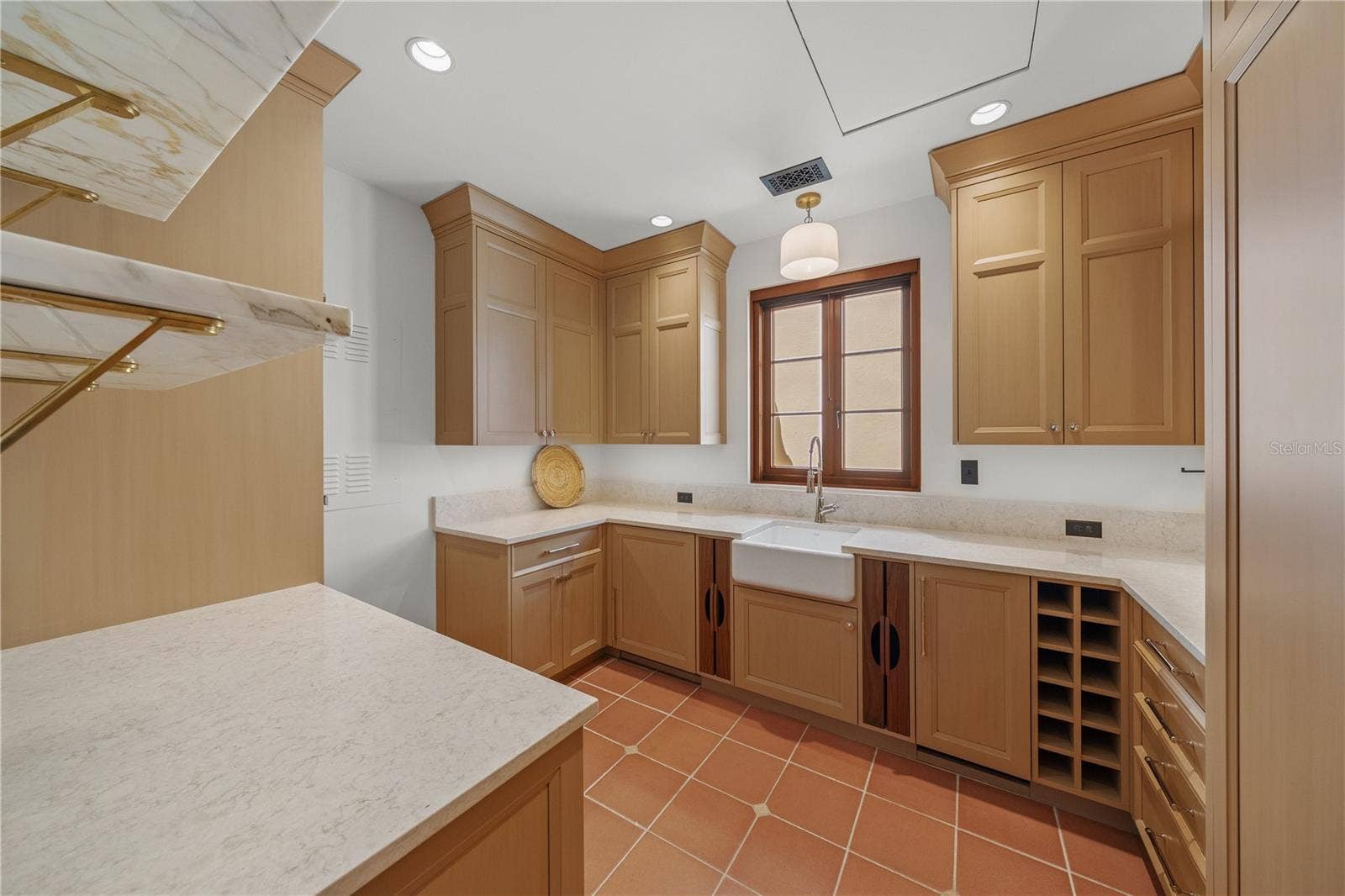139 S WASHINGTON DRIVE, Sarasota, FL 34236 BUTLER'S PARLOR WITH SUB-ZERO REFRIGERATOR, MIELE MICROWAVE, MIELE COFFEE SYSTEM BUILT IN, STAND ALONE BEVERAGE REFRIGERATOR AND STAND ALONE ICE MACHINE. CUSTOM CABINETRY BUILT BY AN AMISH CRAFTSMAN FROM INDIANA.