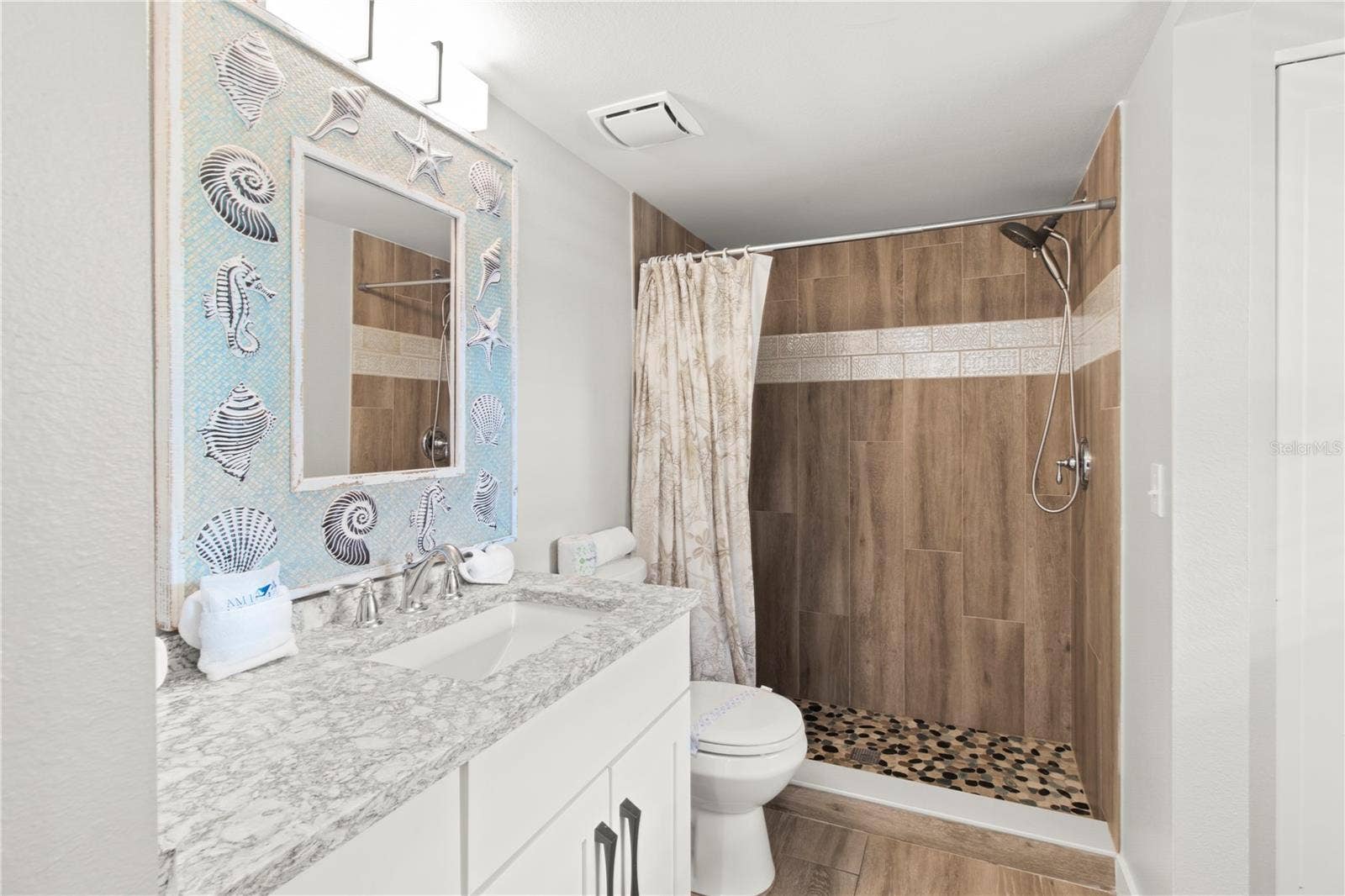 403 N BAY BOULEVARD, Anna Maria, FL 34216 3rd full bathroom on the 1st floor
