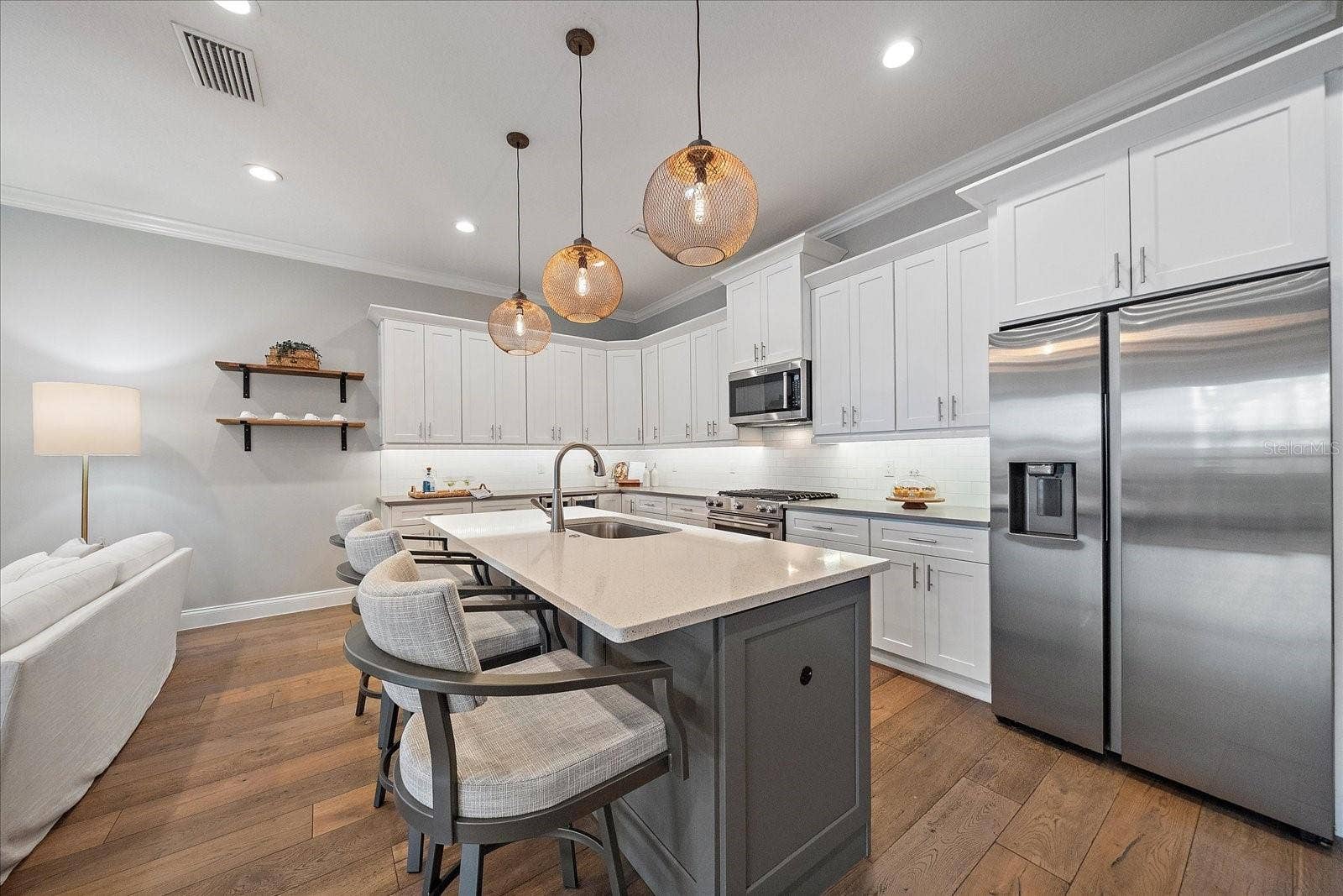 2207 WISTERIA STREET, Sarasota, FL 34239 Kitchen with new stainless steel appliances, quartz countertops, wine fridge - 1st Floor