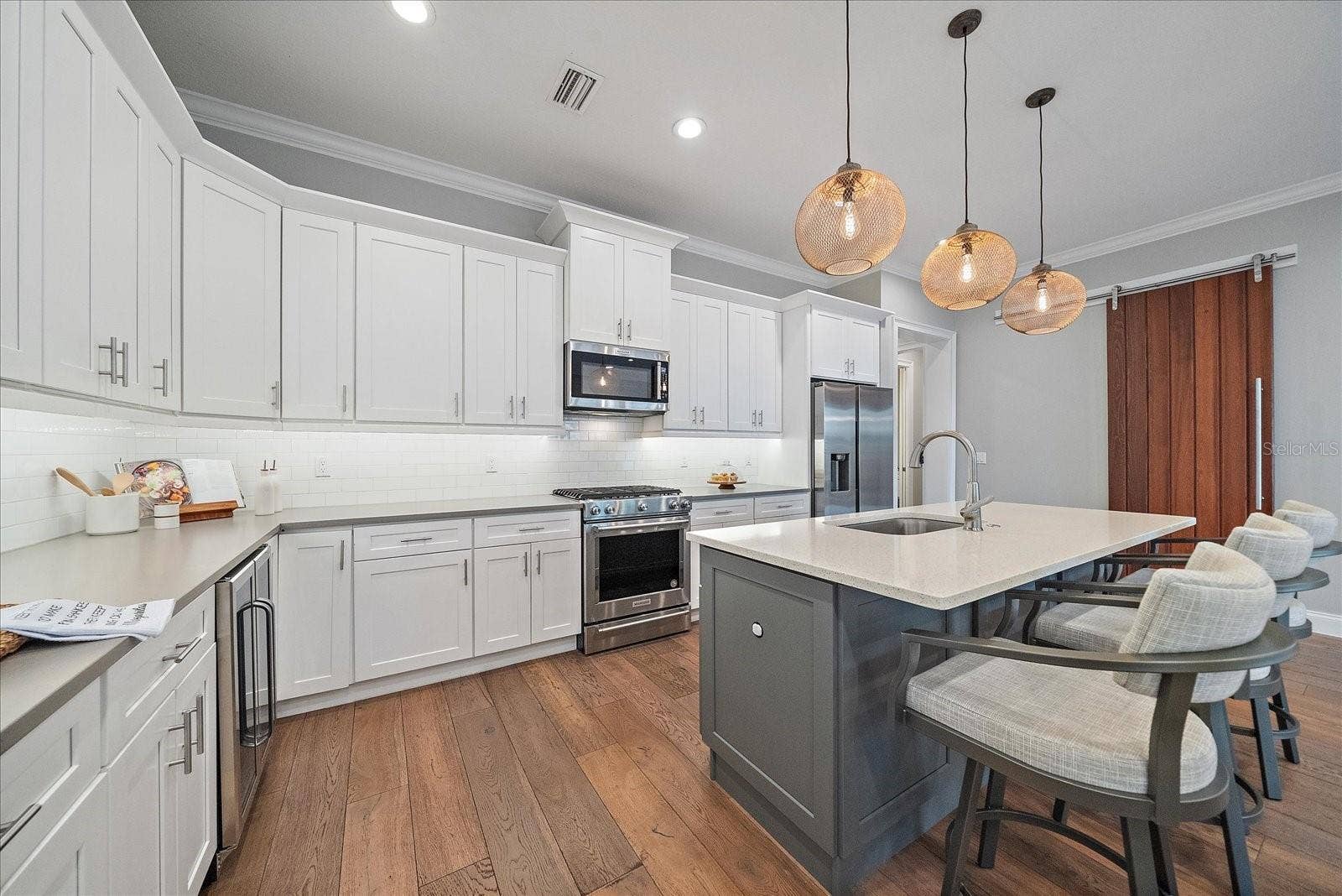 2207 WISTERIA STREET, Sarasota, FL 34239 Kitchen with Eat-in Island - 1st Floor