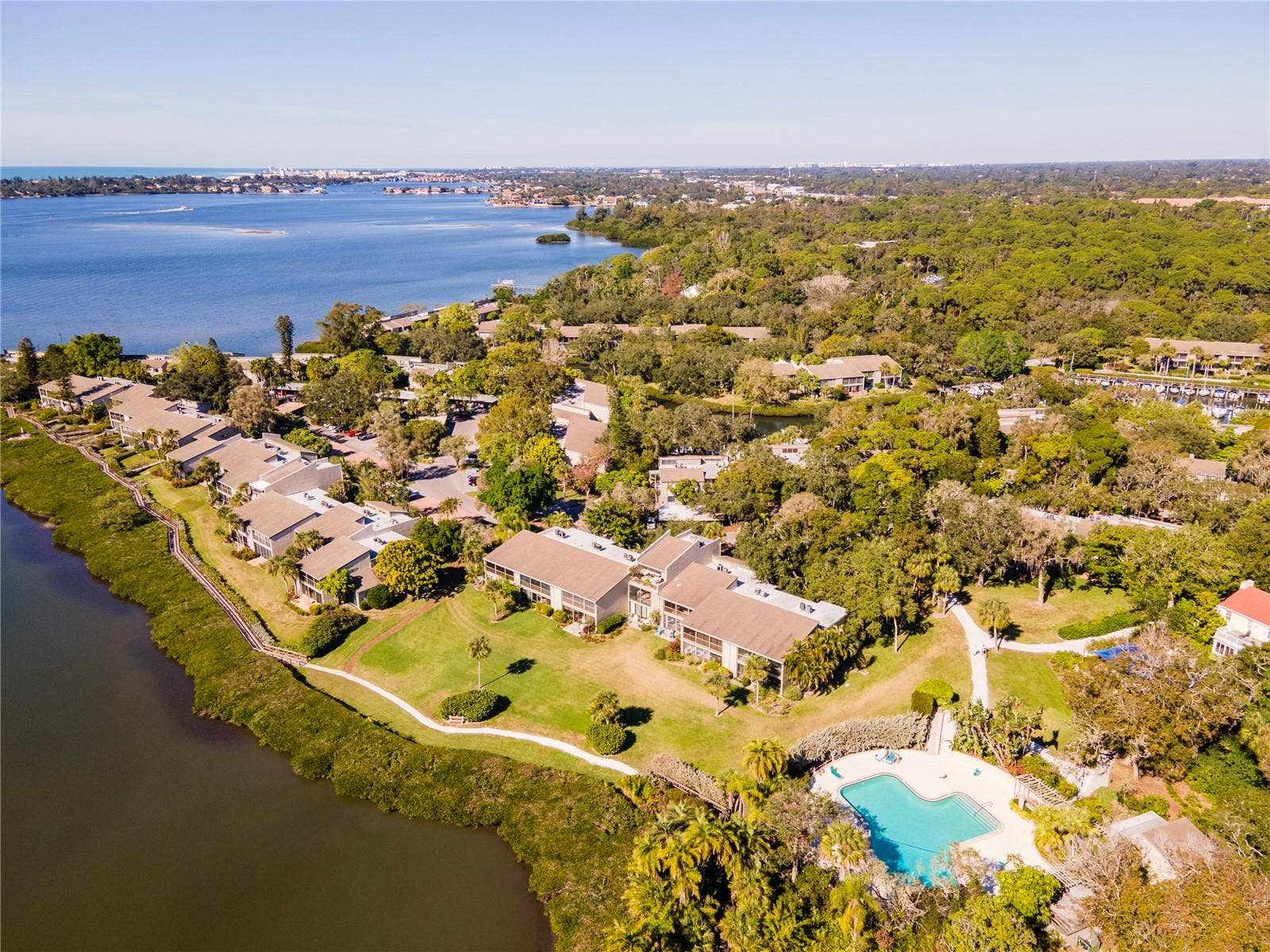 1633 BOATHOUSE CIRCLE, #232, Sarasota, FL 34231 Overview of Wilbanks pool (one of six) within Pelican Cove