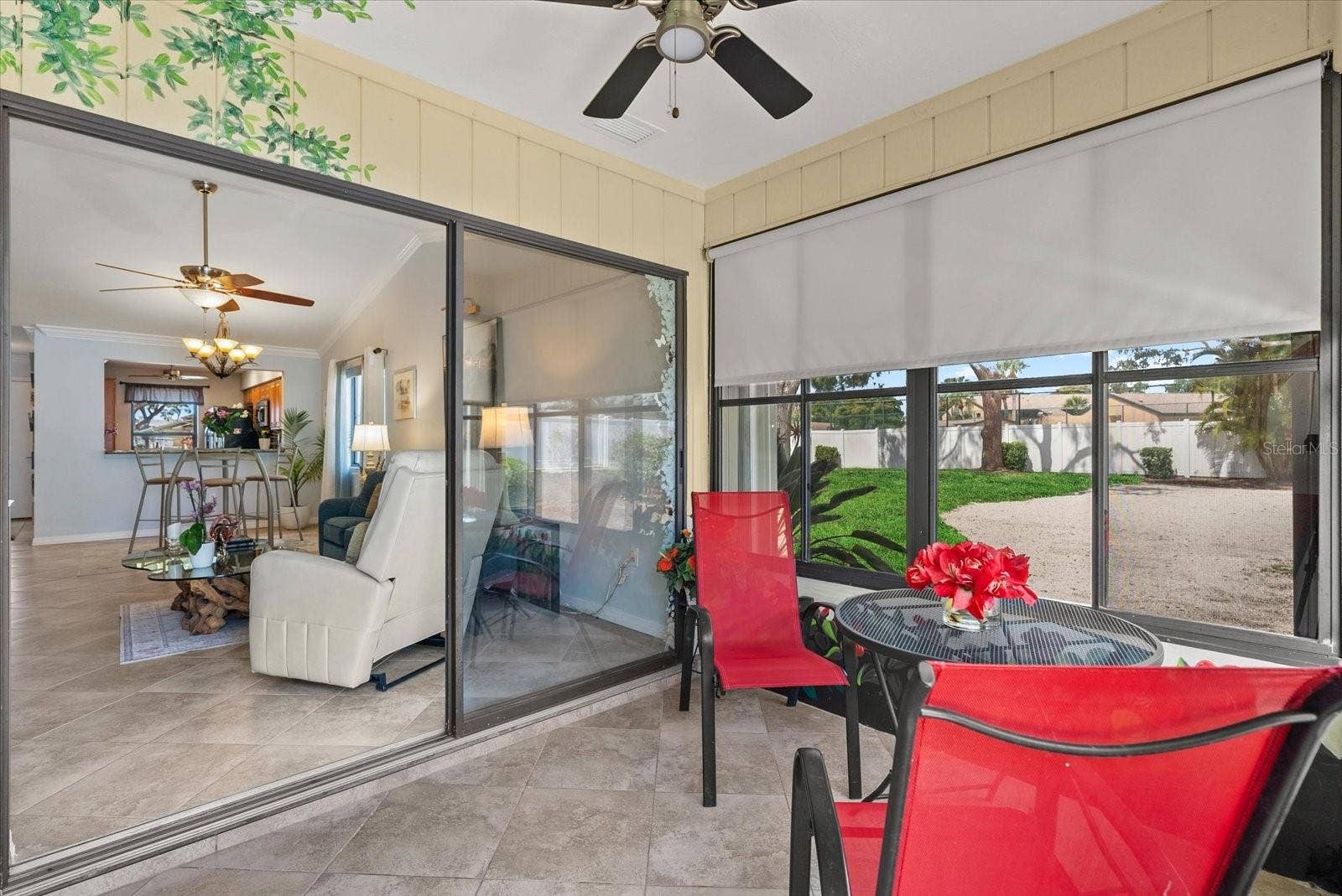 2723 60TH AVENUE DRIVE W, #2723, Bradenton, FL 34207 screened Florida lanai with a large storage closet.
