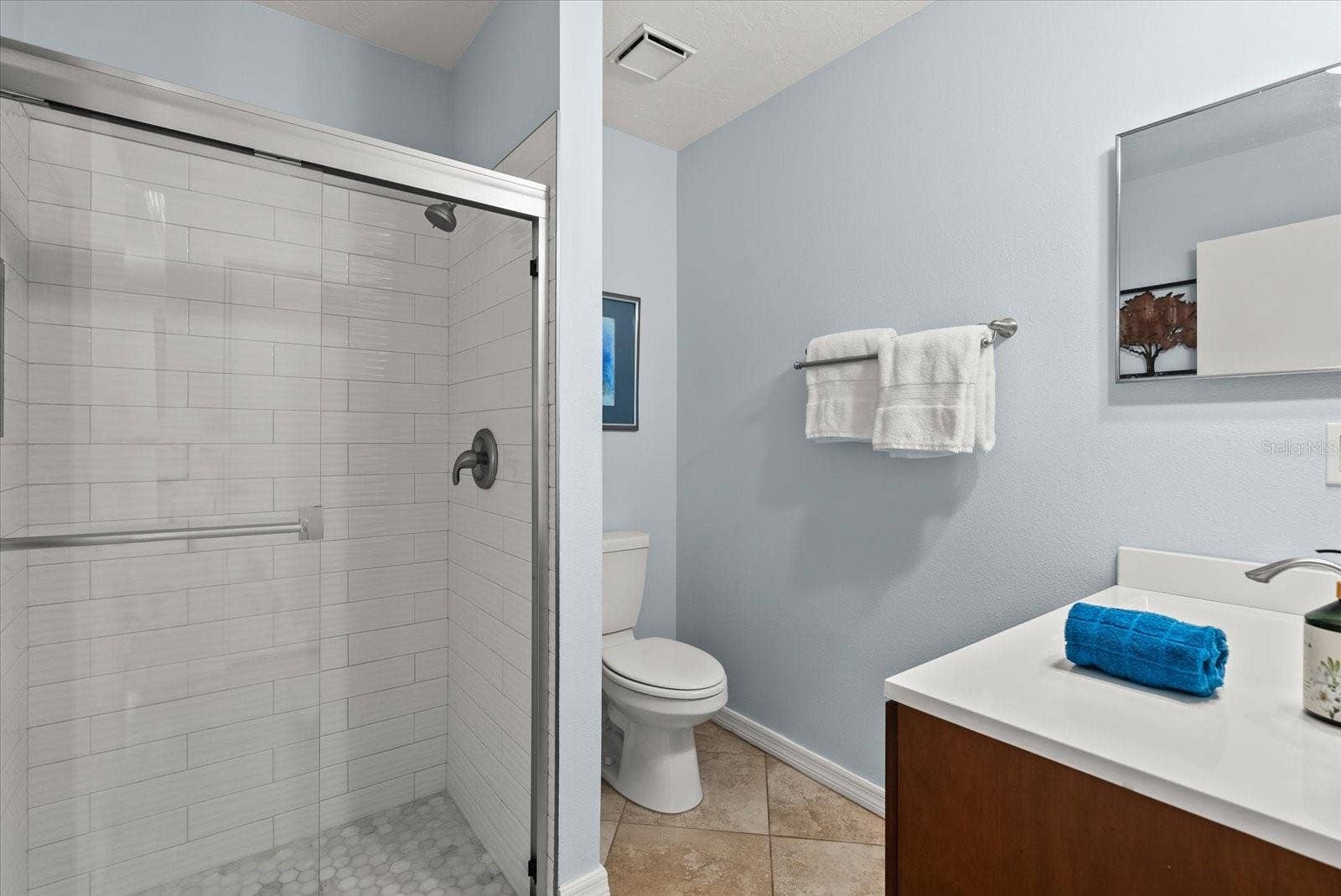 2723 60TH AVENUE DRIVE W, #2723, Bradenton, FL 34207 Newer Guest Bath with custom tile in shower.