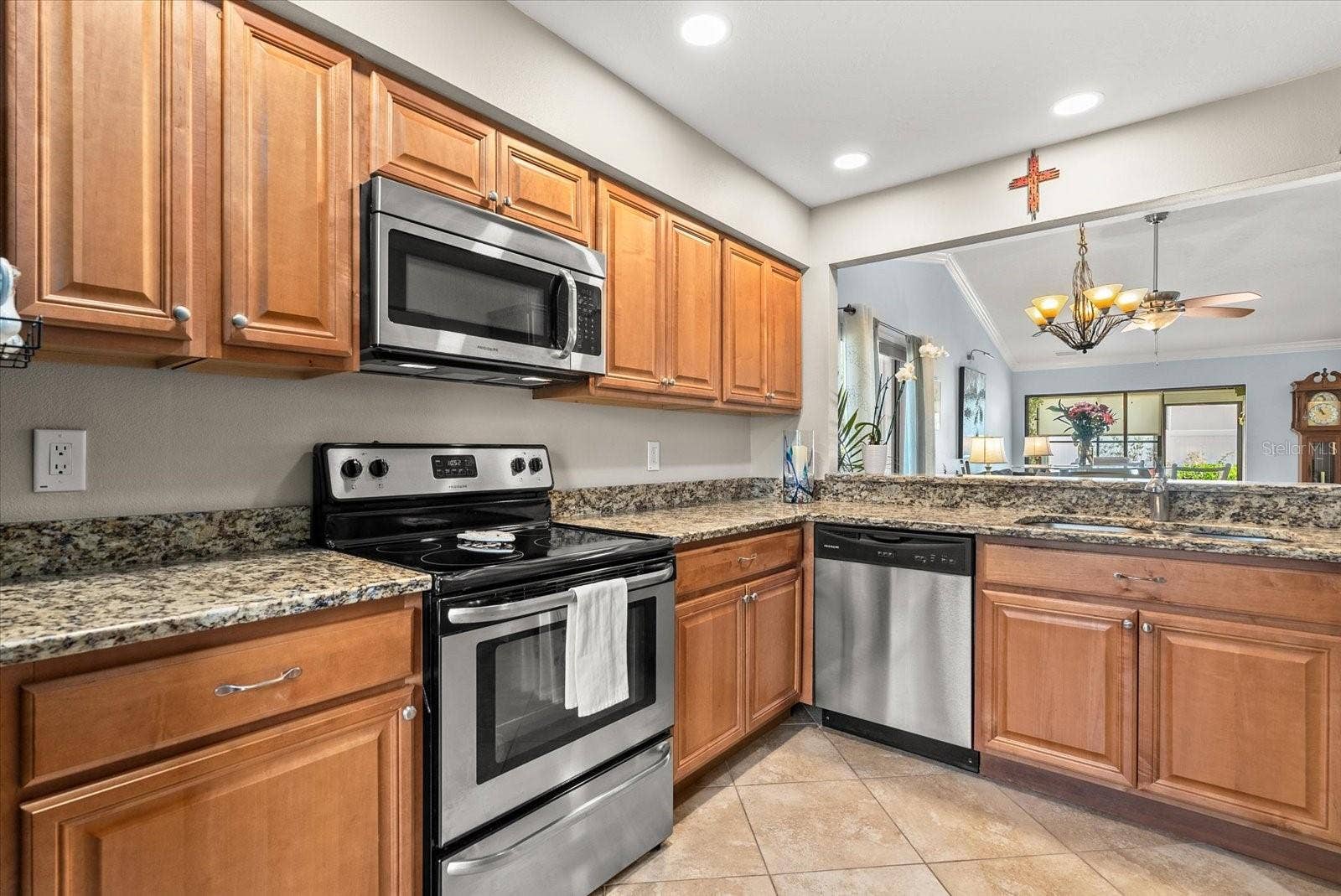 2723 60TH AVENUE DRIVE W, #2723, Bradenton, FL 34207 Updated kitchen with newer SS appliances and granite countertops.