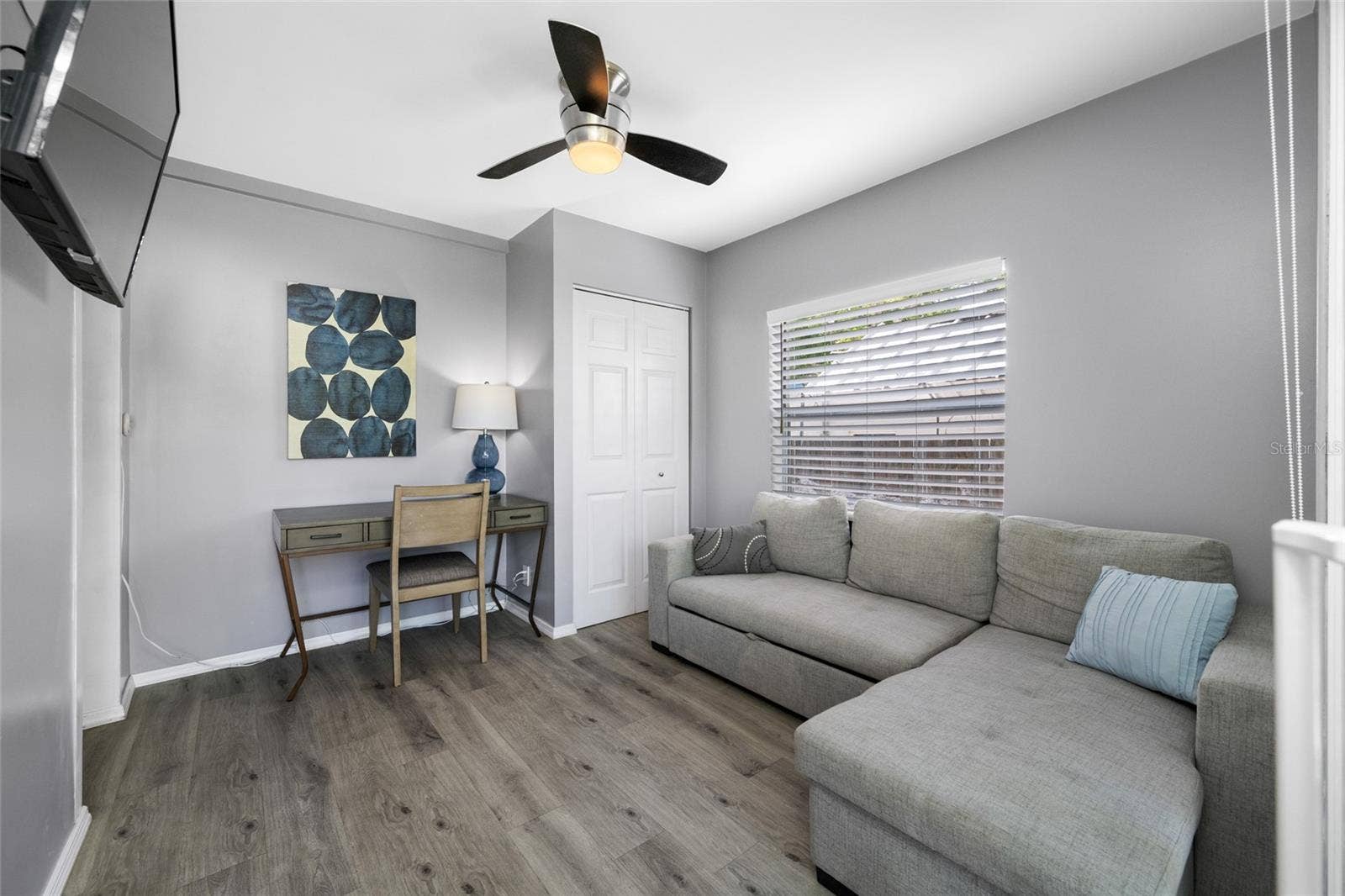 5044 BETTY STREET N, St Petersburg, FL 33709 Bedroom 3 / Office with built in closet and slider opening to the back deck.