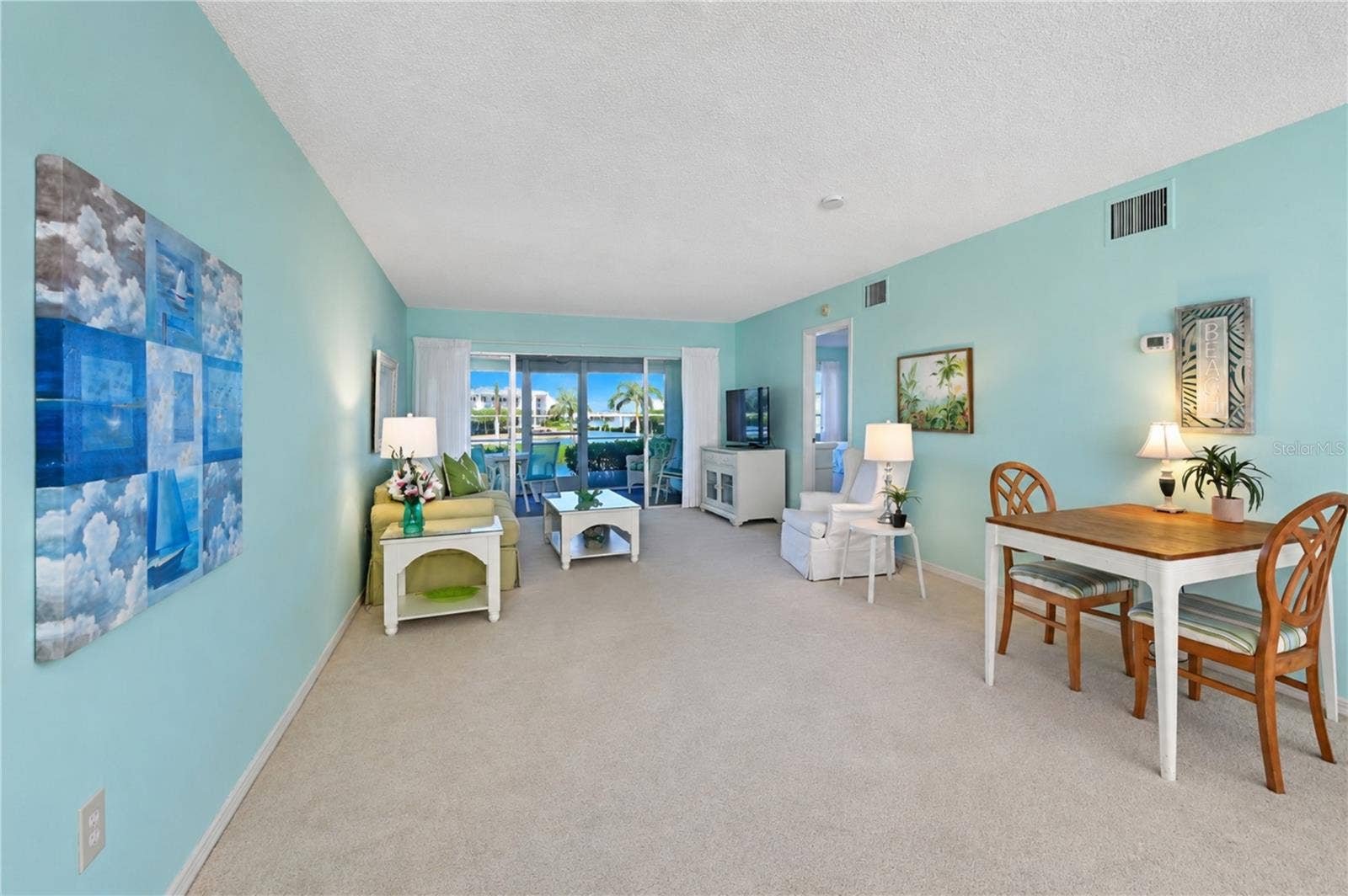 4809 INDEPENDENCE DRIVE, Bradenton, FL 34210 Dining through dining, living and lanai