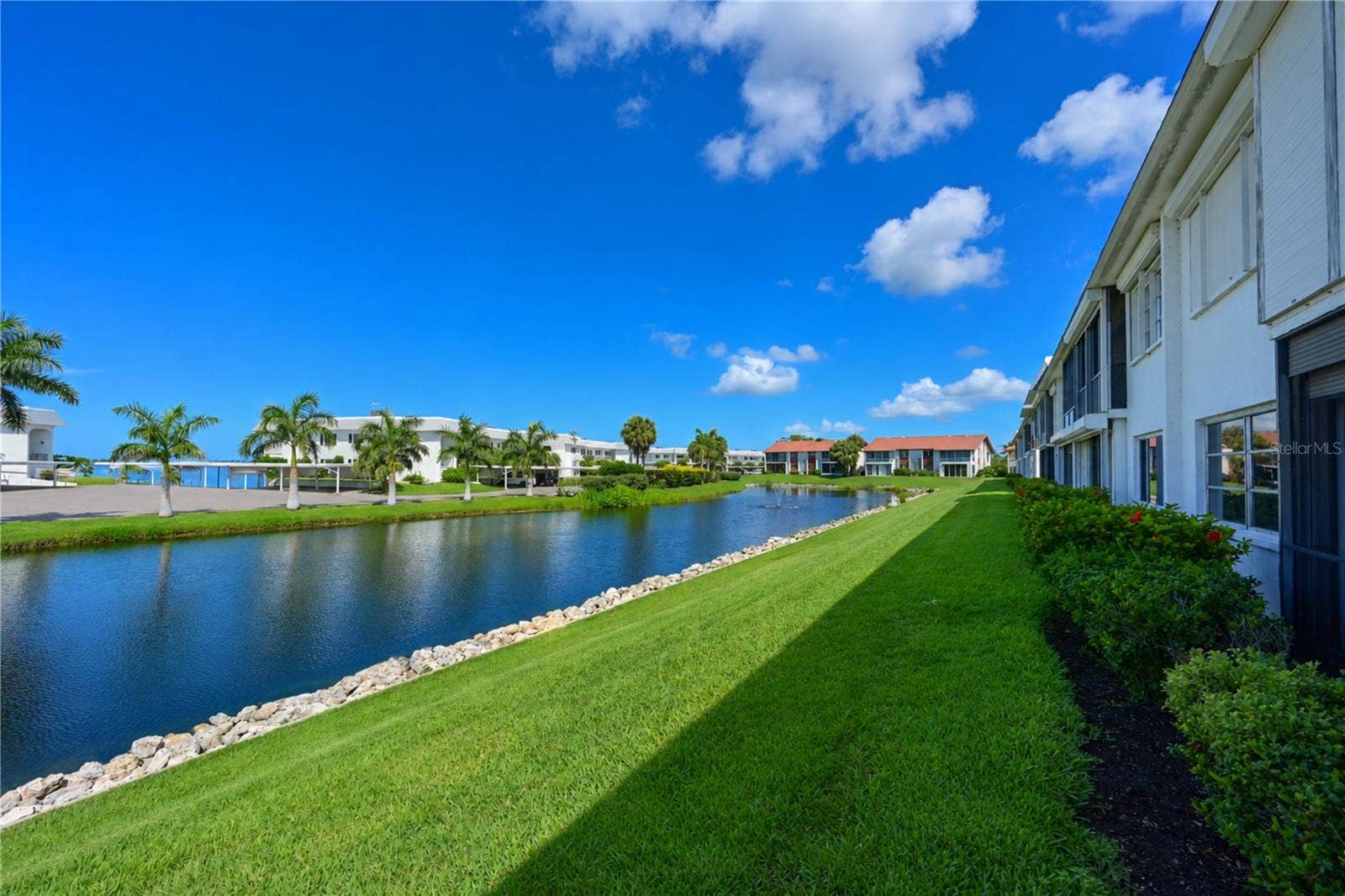 4809 INDEPENDENCE DRIVE, Bradenton, FL 34210 View across back of condo towards clubhouse