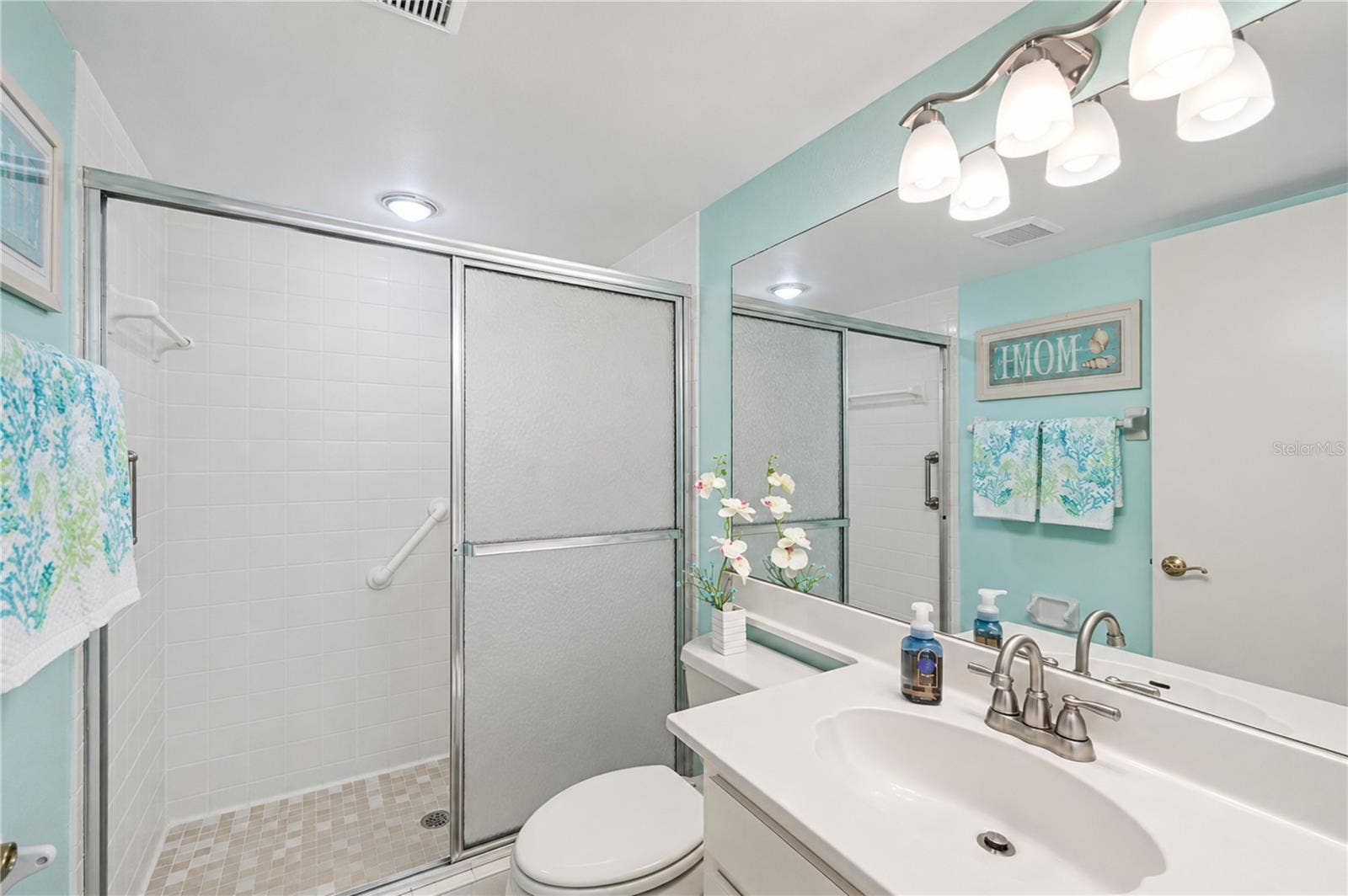 4809 INDEPENDENCE DRIVE, Bradenton, FL 34210 Primary bathroom with walk in shower with safty bars