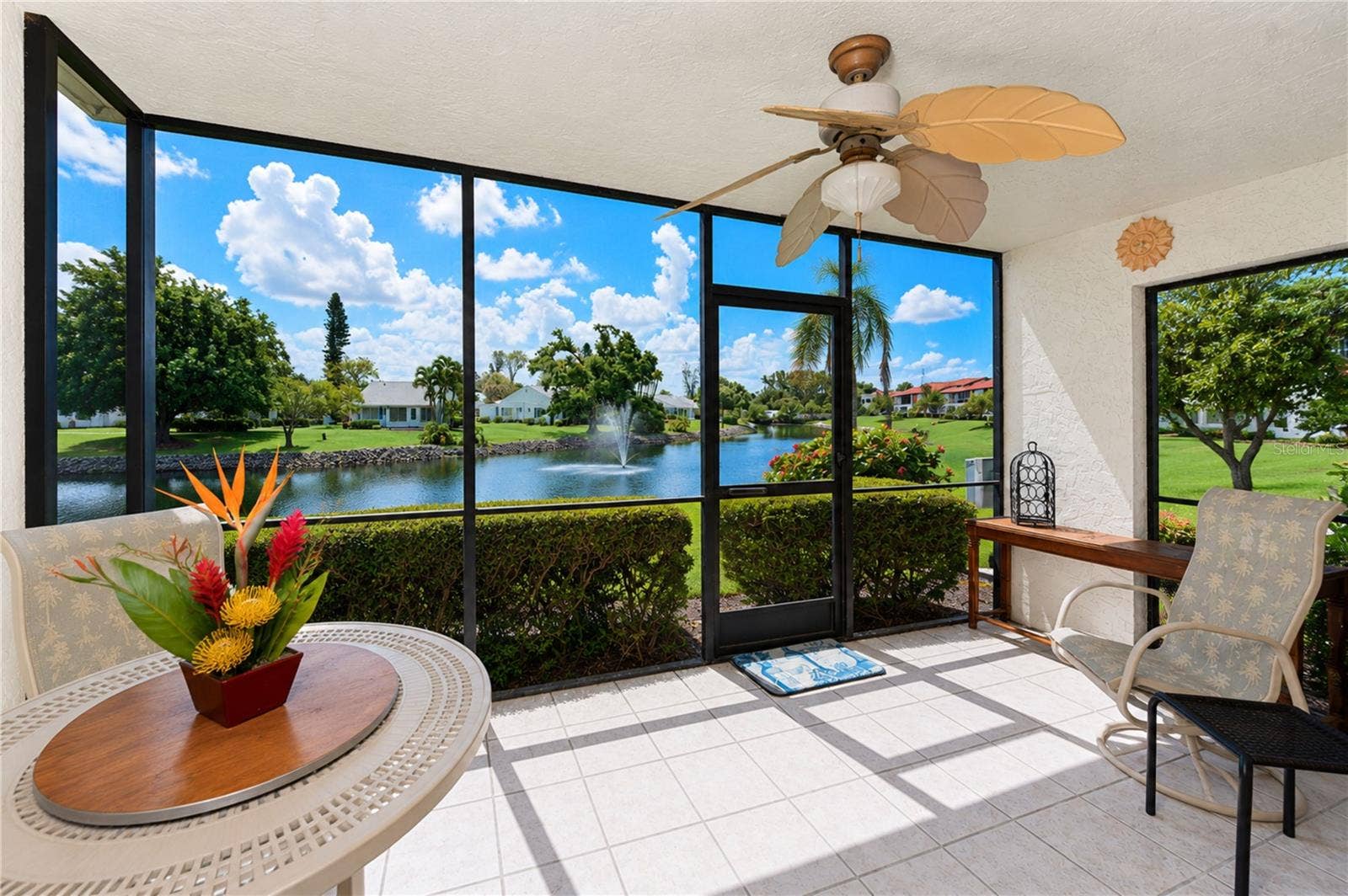 4853 INDEPENDENCE DRIVE, Bradenton, FL 34210 Relax on the screened lanai and bird watch by day