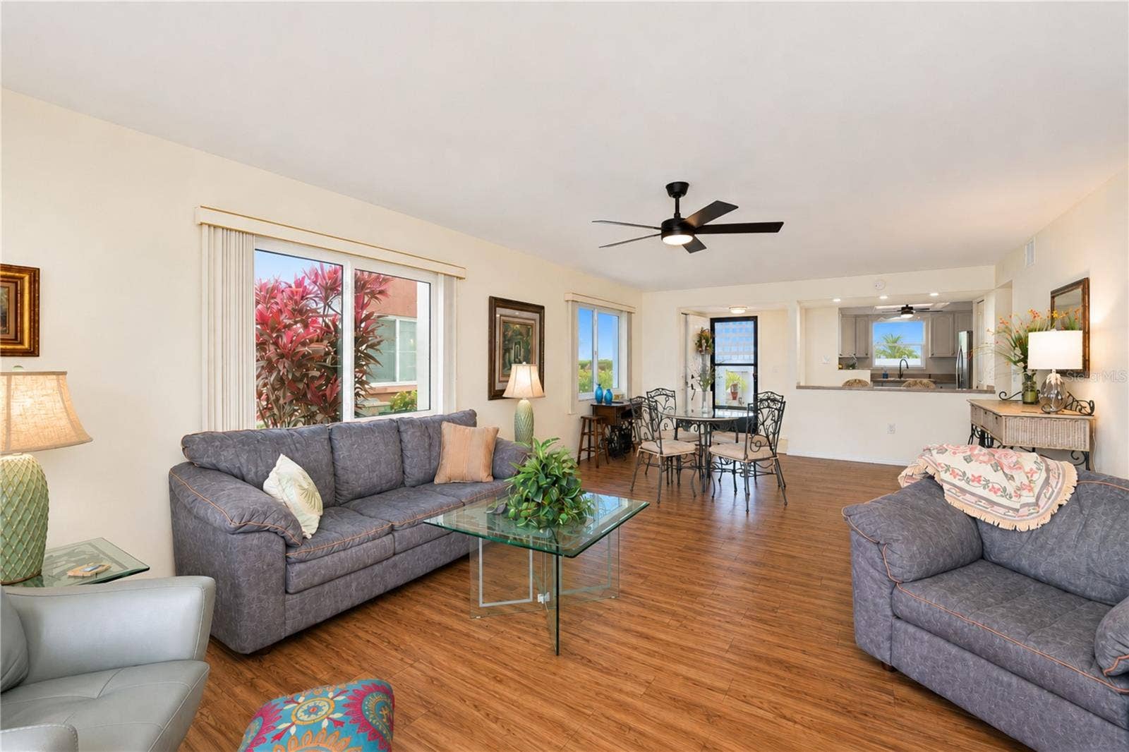 4853 INDEPENDENCE DRIVE, Bradenton, FL 34210 Back inside the entertaining area featuring the planking flooring