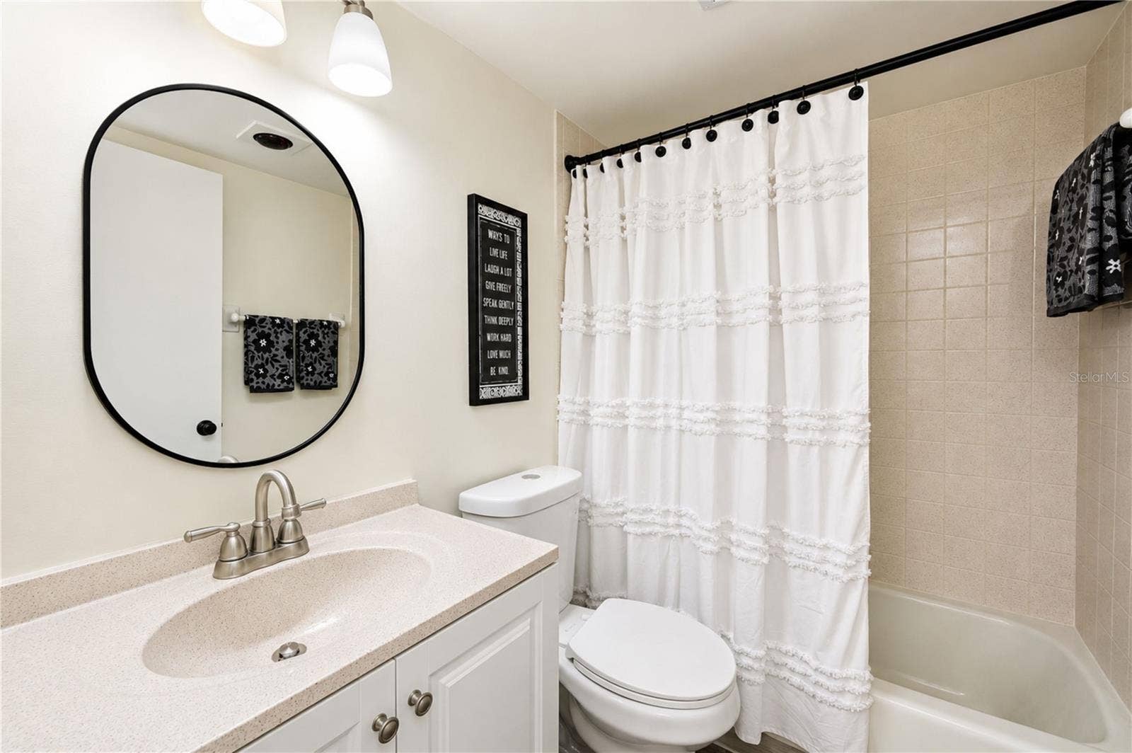 4853 INDEPENDENCE DRIVE, Bradenton, FL 34210 The adjacent secondary bathroom is nicely updated