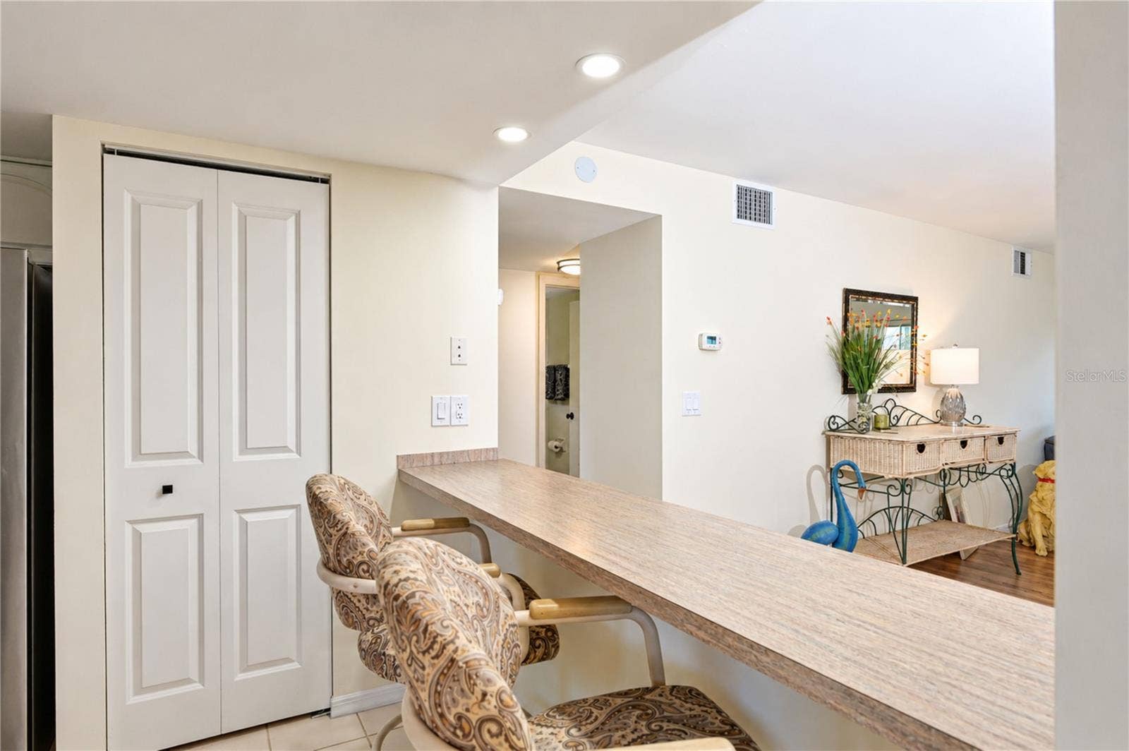 4853 INDEPENDENCE DRIVE, Bradenton, FL 34210 Breakfast bar and closet pantry are so convenient