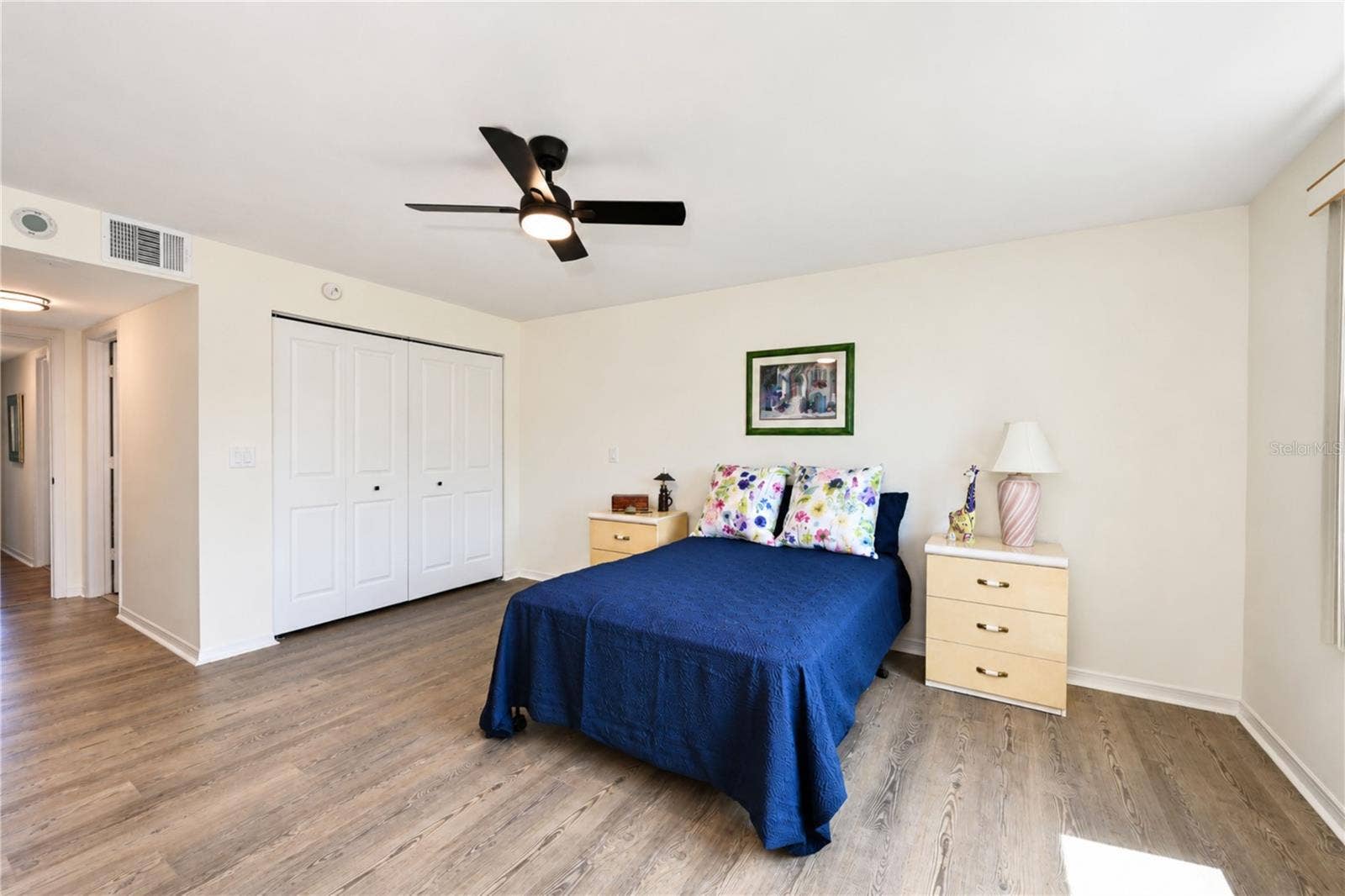 4853 INDEPENDENCE DRIVE, Bradenton, FL 34210 Primary bedroom has dual closets, one seen here and one across from the ensuite bathroom