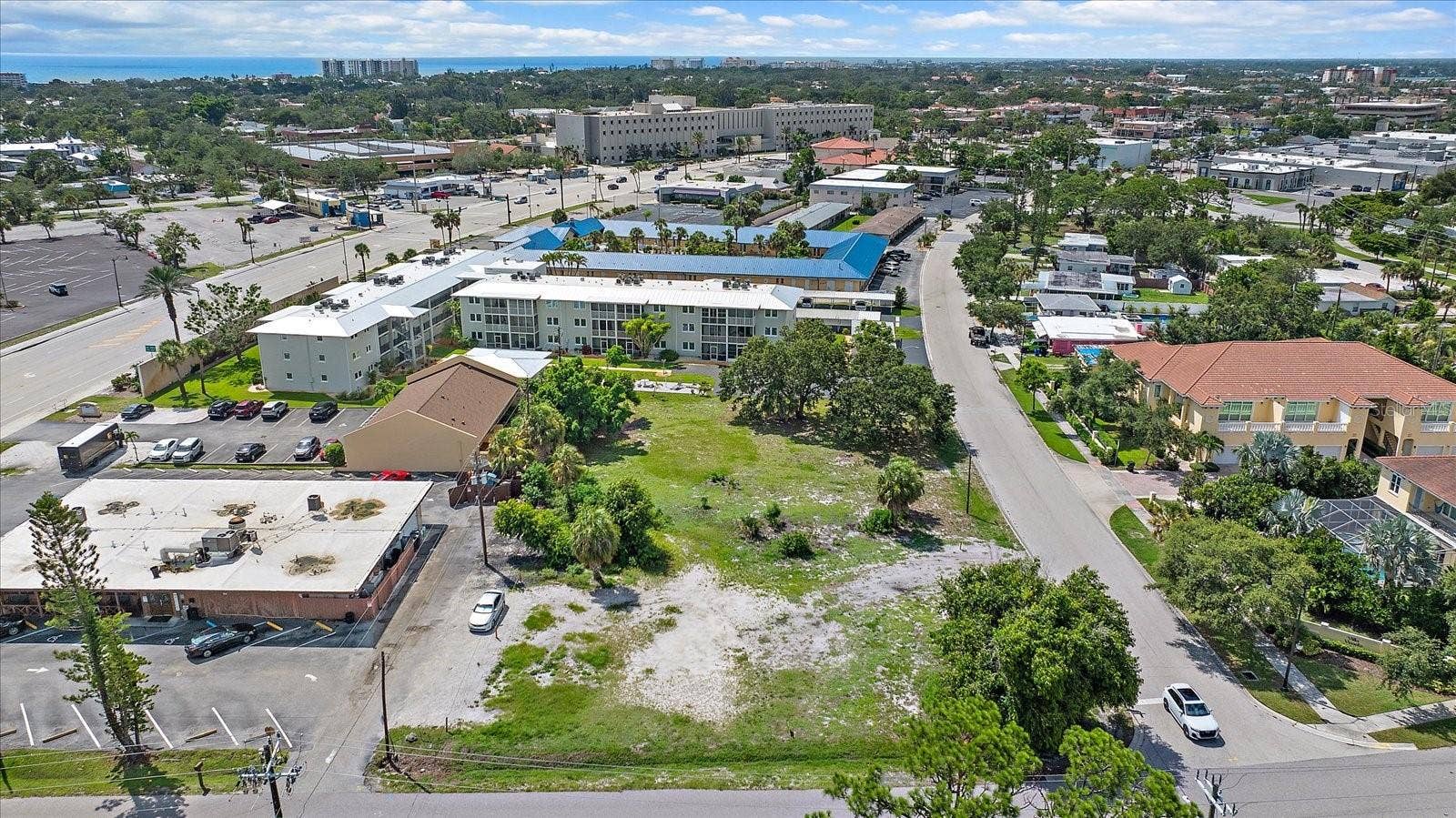 648 GUILD DRIVE, Venice, FL 34285 Aerial view of the lot with Gulf waters visible on the horizon