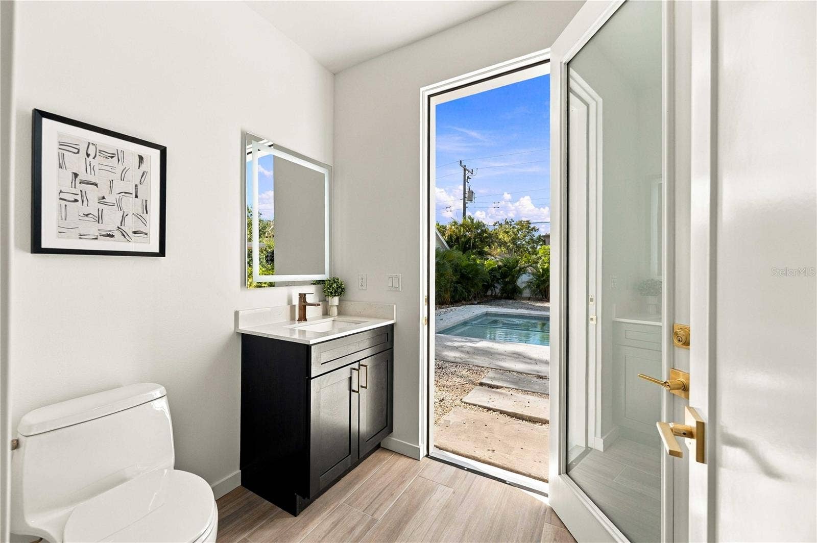 2258 ARLINGTON STREET, Sarasota, FL 34239 1st Floor guest bathroom & pool Bathroom