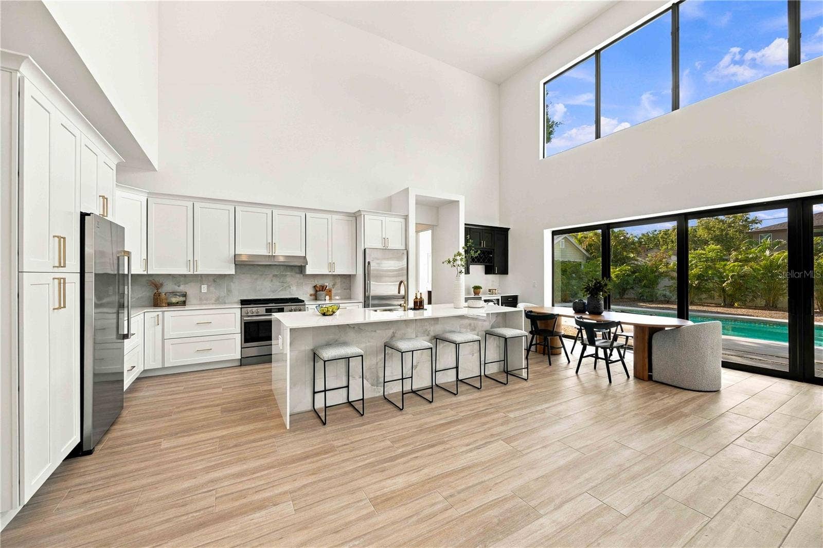 2258 ARLINGTON STREET, Sarasota, FL 34239 Expansive eat-in kitchen/ Dining area with separate fridge & freezers