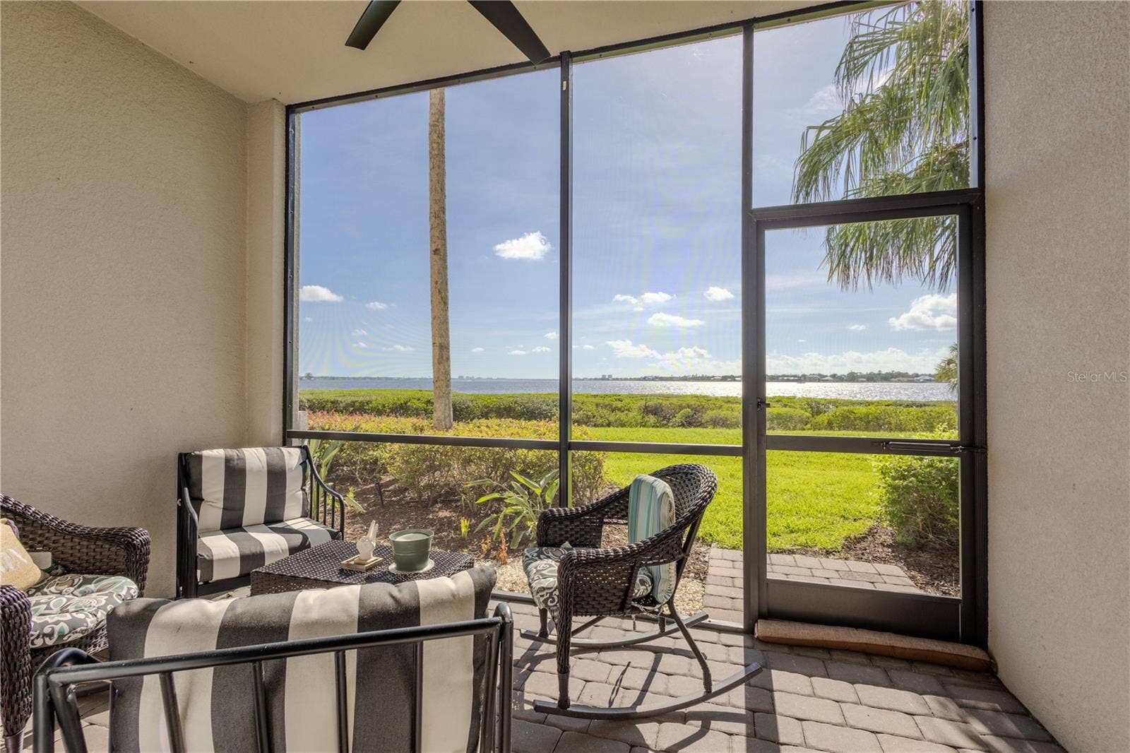 1030 TIDEWATER SHORES LOOP, #104, Bradenton, FL 34208 Screened Patio. View of the Manatee River