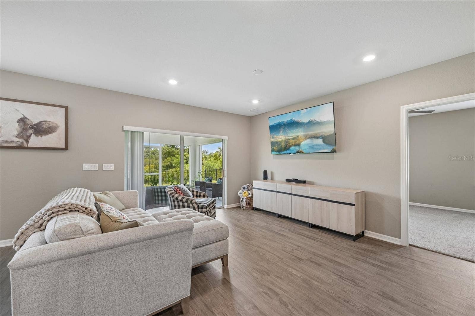 rear living room leading to owners suite