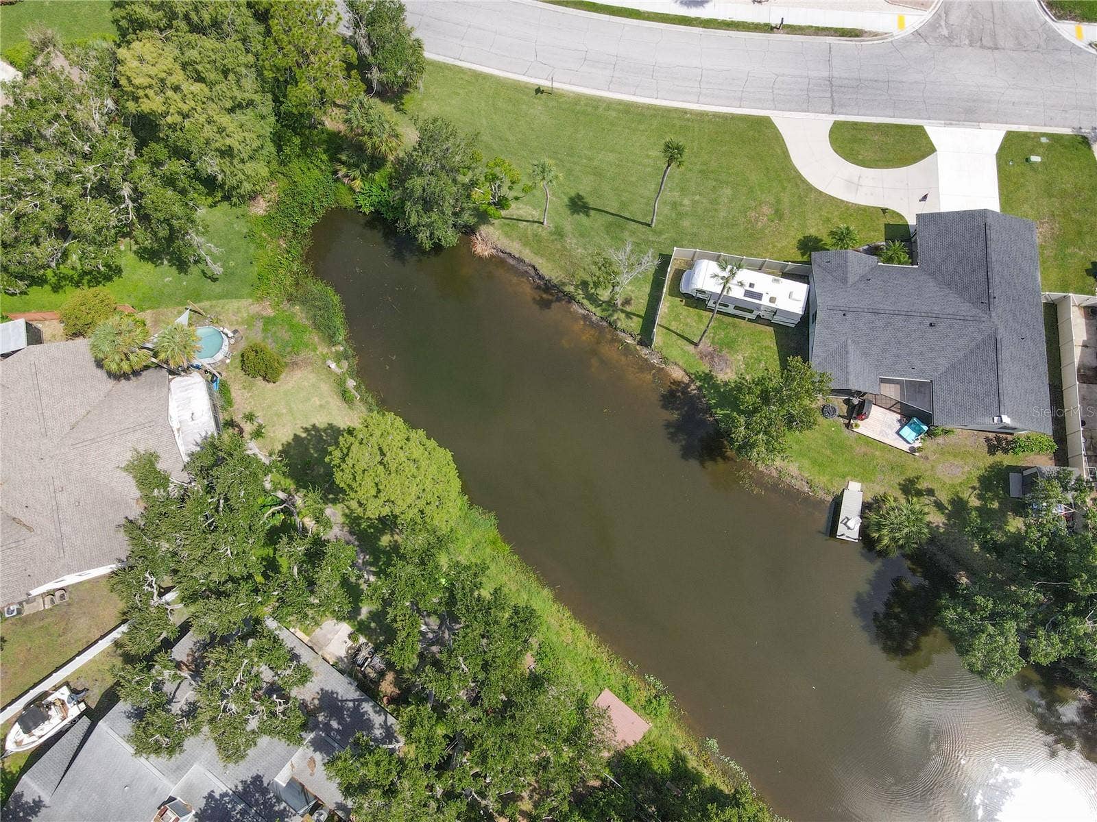 7905 55TH STREET E, Palmetto, FL 34221 LAKE & PROPERTY AERIAL