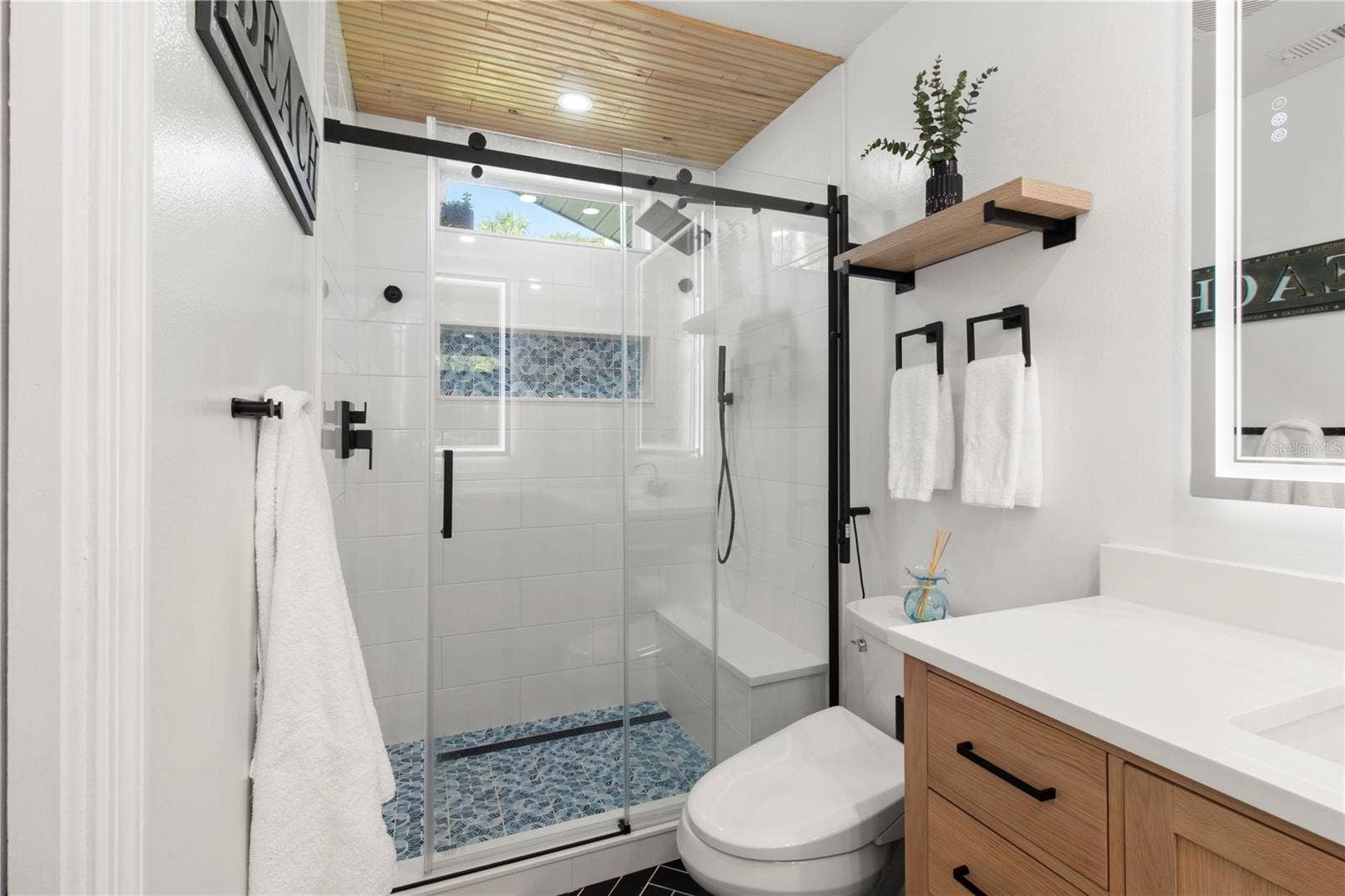 7905 55TH STREET E, Palmetto, FL 34221 RELAXING WALK-IN TILED RAINSHOWER W/CUSTOM BENCH