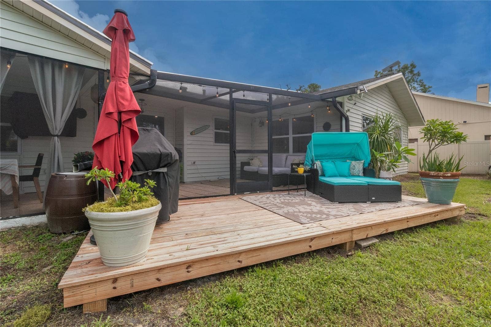 7905 55TH STREET E, Palmetto, FL 34221 RELAXING GRILLING & SEATING AREA