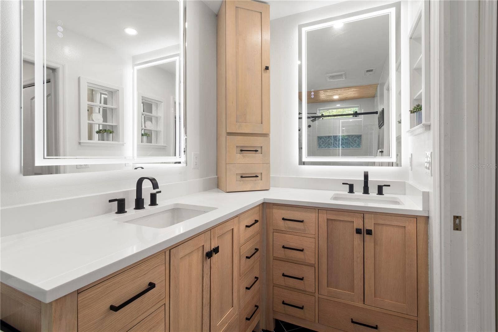 7905 55TH STREET E, Palmetto, FL 34221 PRIMARY BATH W/CUSTOM WOOD CABINETRY, LIGHTEDW/ANTI FOG MIRRORS & CUSTOM QUARTZ COUNTERTOPS