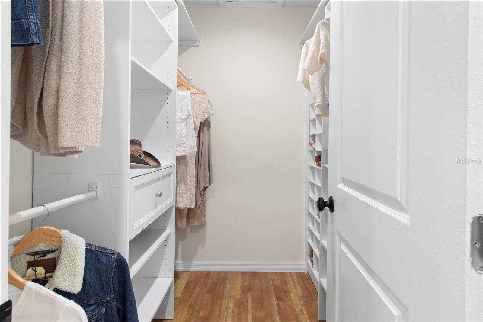 7905 55TH STREET E, Palmetto, FL 34221 PRIMARY SUITE WALK IN CLOSET SYSTEM TO INLCUDE A SHOE ORGANIZER