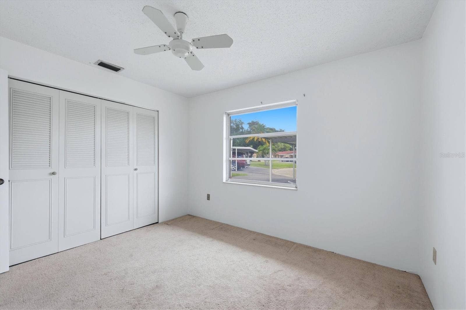 4538 PAWNEE TRAIL, #197, Sarasota, FL 34233 Guest room with large closet
