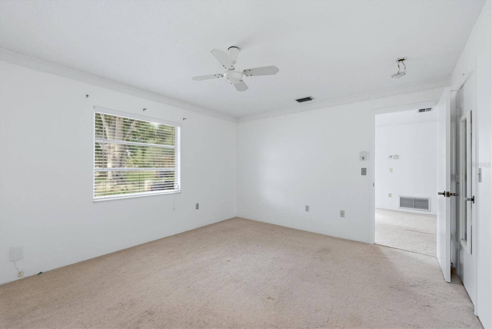 4538 PAWNEE TRAIL, #197, Sarasota, FL 34233 Primary bedroom faces peaceful backyard