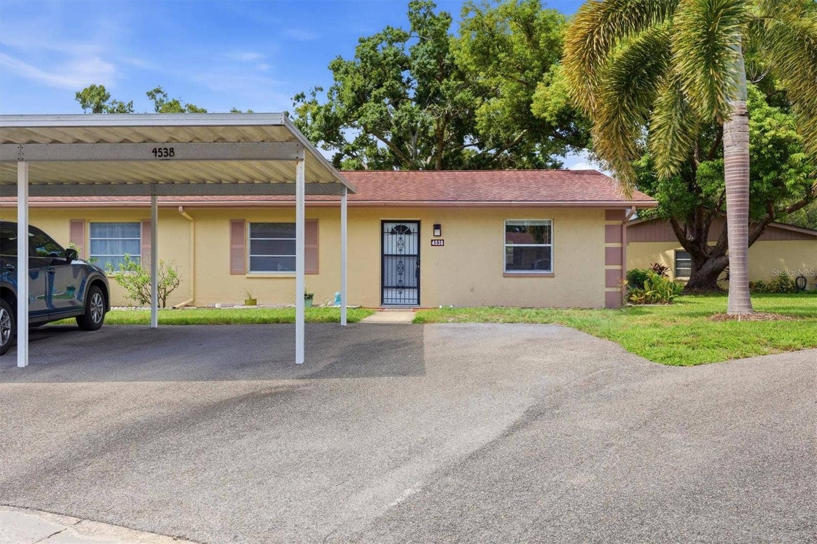 4538 PAWNEE TRAIL, #197, Sarasota, FL 34233 Designated carport and guest parking right out front
