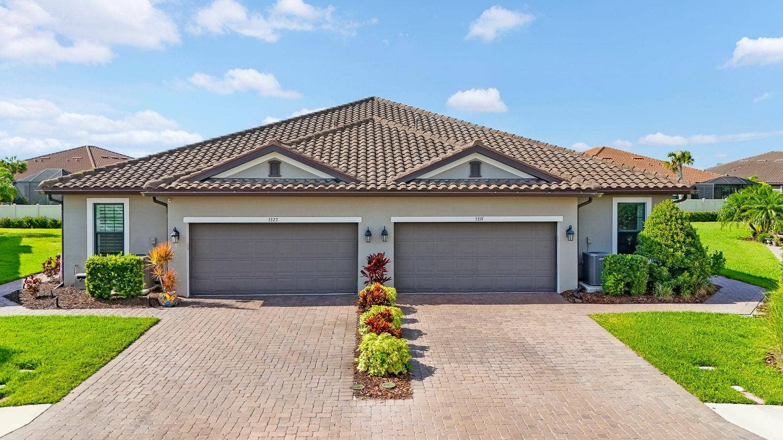 5319 TALIAFERRO COURT, Palmetto, FL 34221 Right side villa, paver driveway, tile roofs