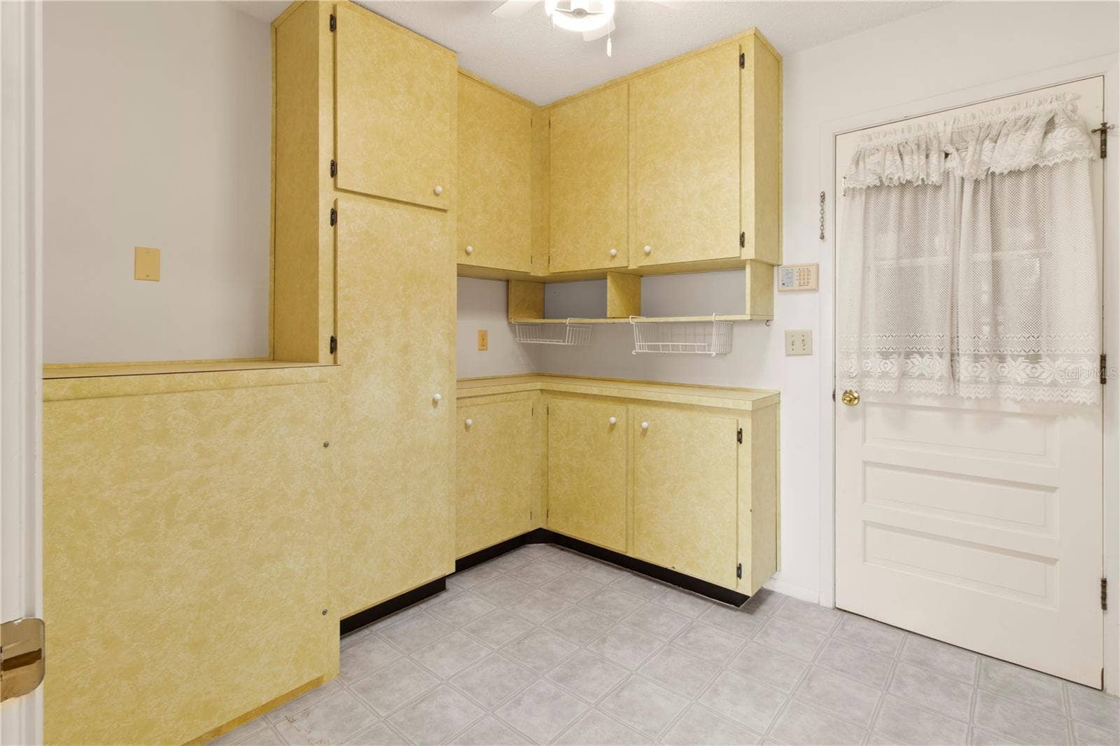 7011 10TH AVENUE W, Bradenton, FL 34209 utility/laundry room