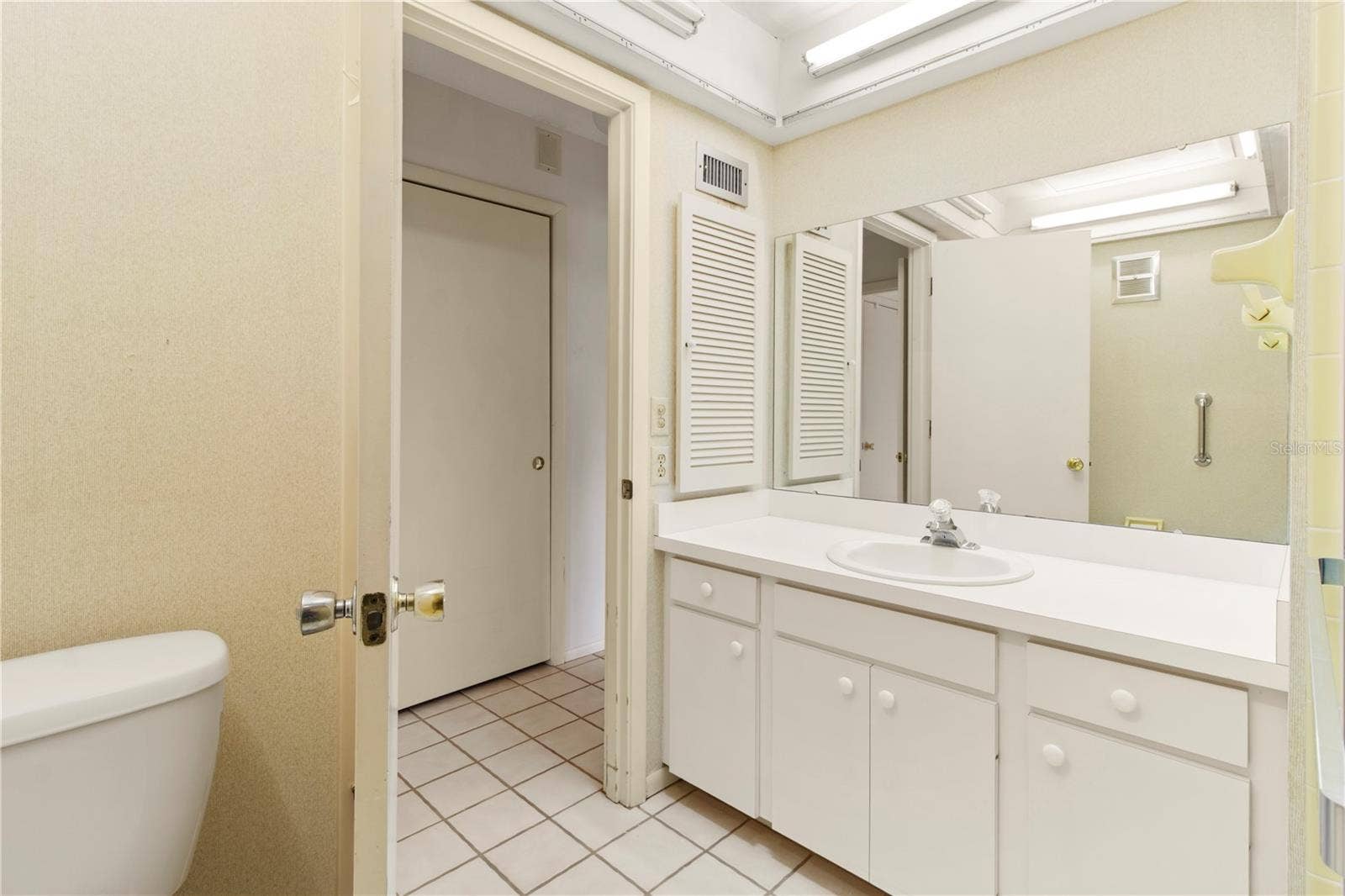 7011 10TH AVENUE W, Bradenton, FL 34209 hall bath