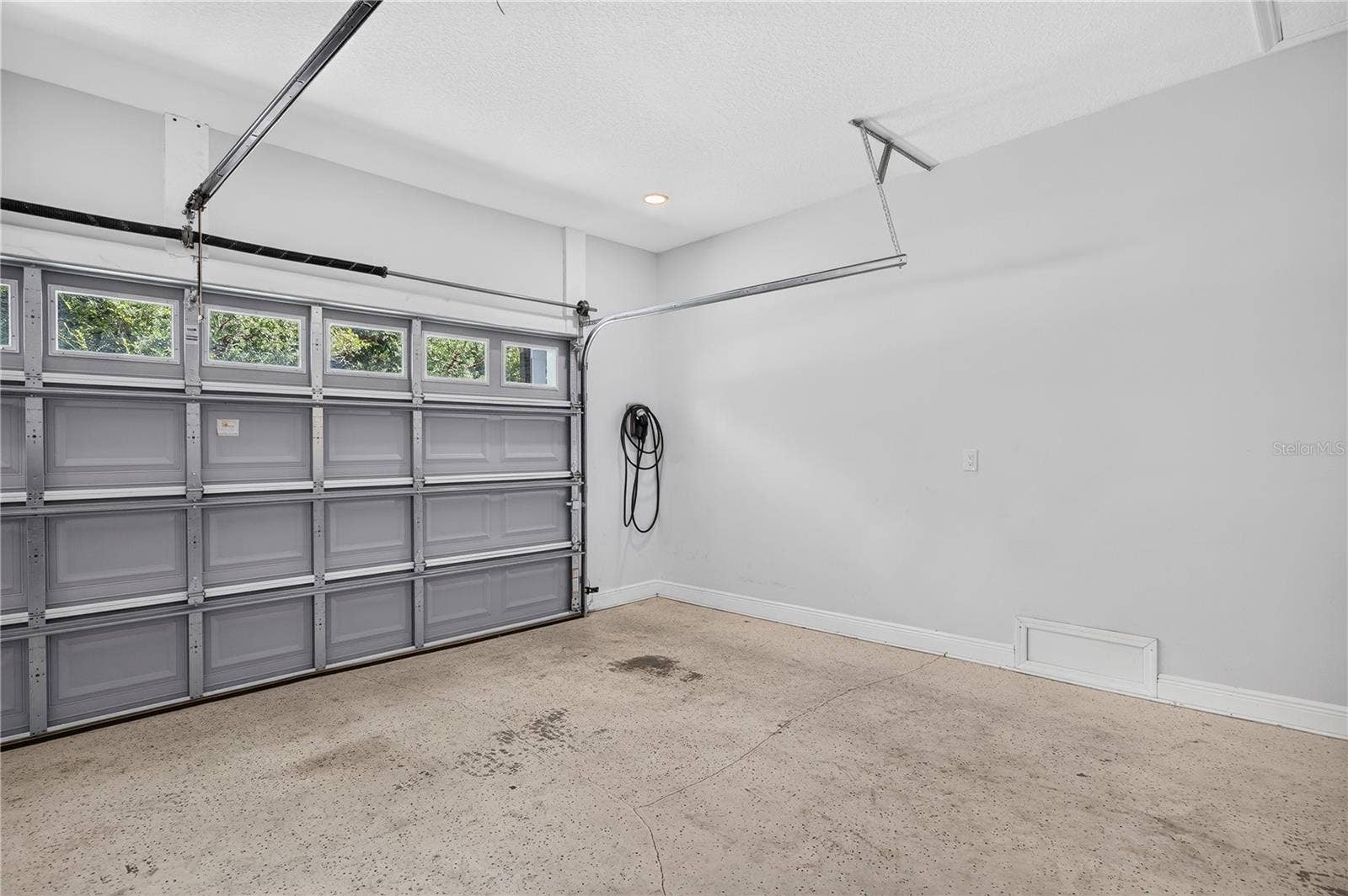 Level 2 EV charger in the corner