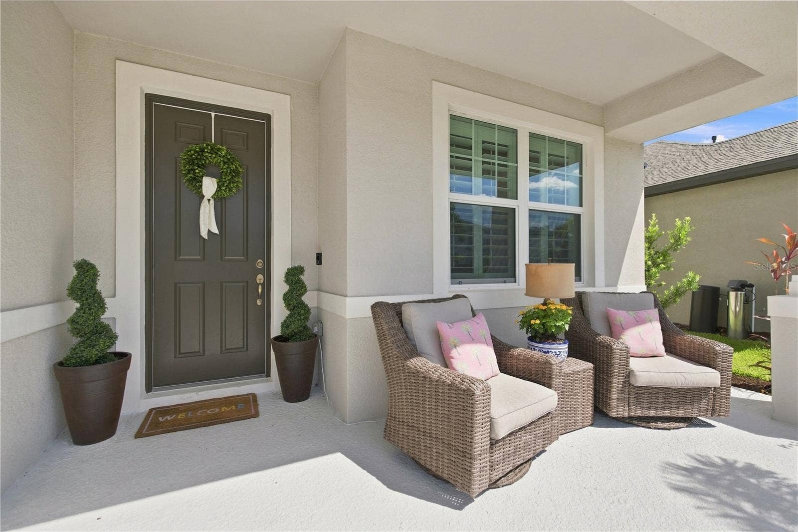 8219 TEA OLIVE TERRACE, Palmetto, FL 34221 Front Covered Patio Entrance