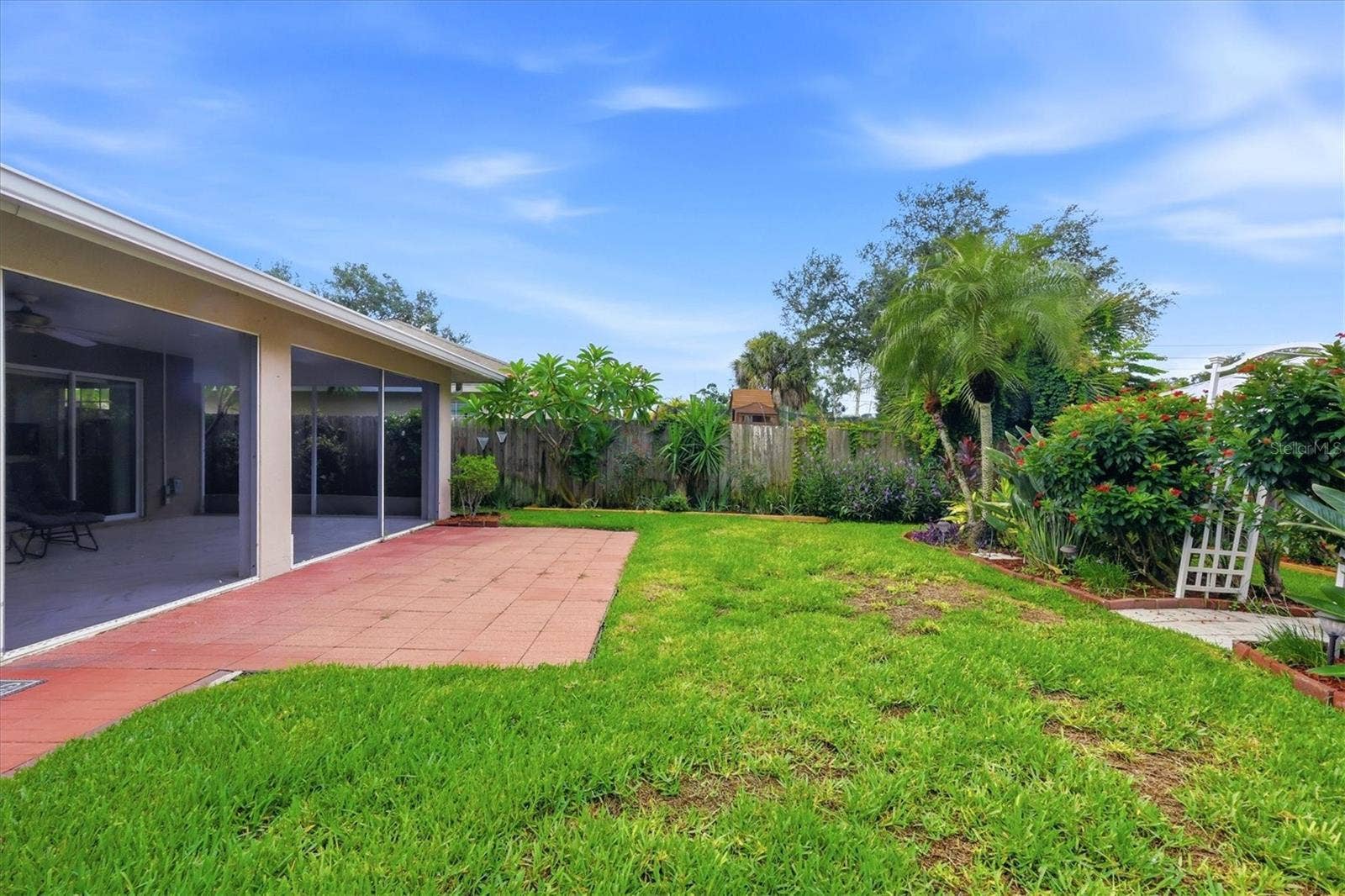 4380 IOLA DRIVE, Sarasota, FL 34231 Landscaped Backyard