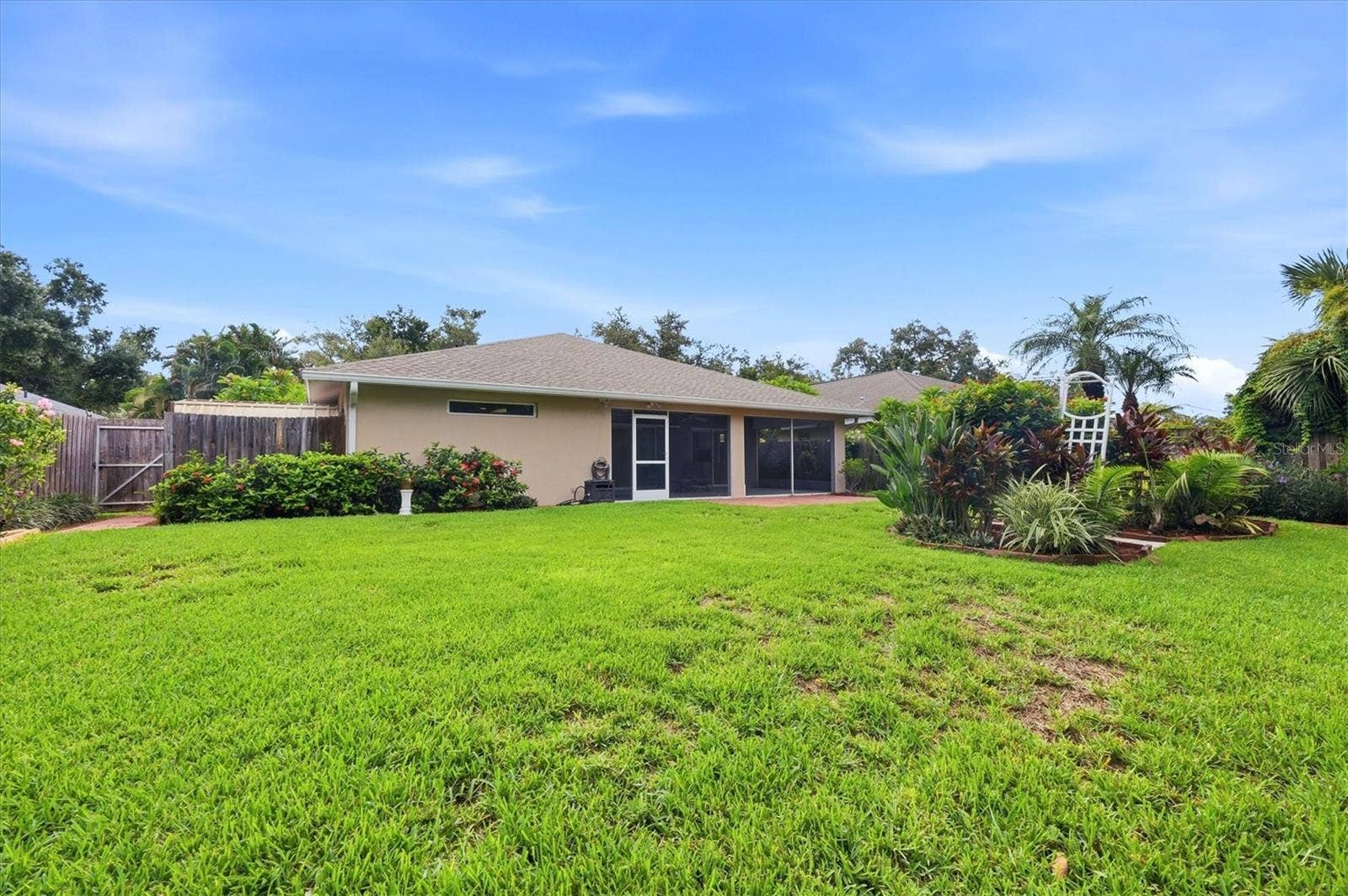 4380 IOLA DRIVE, Sarasota, FL 34231 Landscaped Backyard