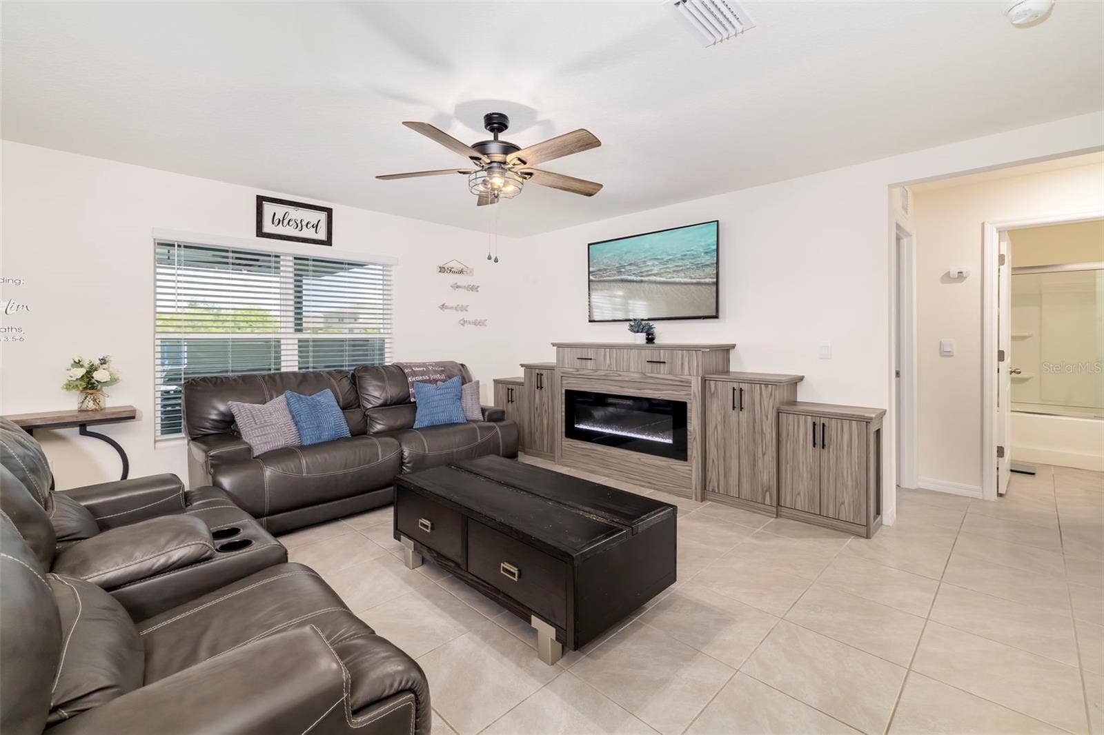 5118 ROCKY COAST PLACE, Palmetto, FL 34221 built in entertainment with fire place