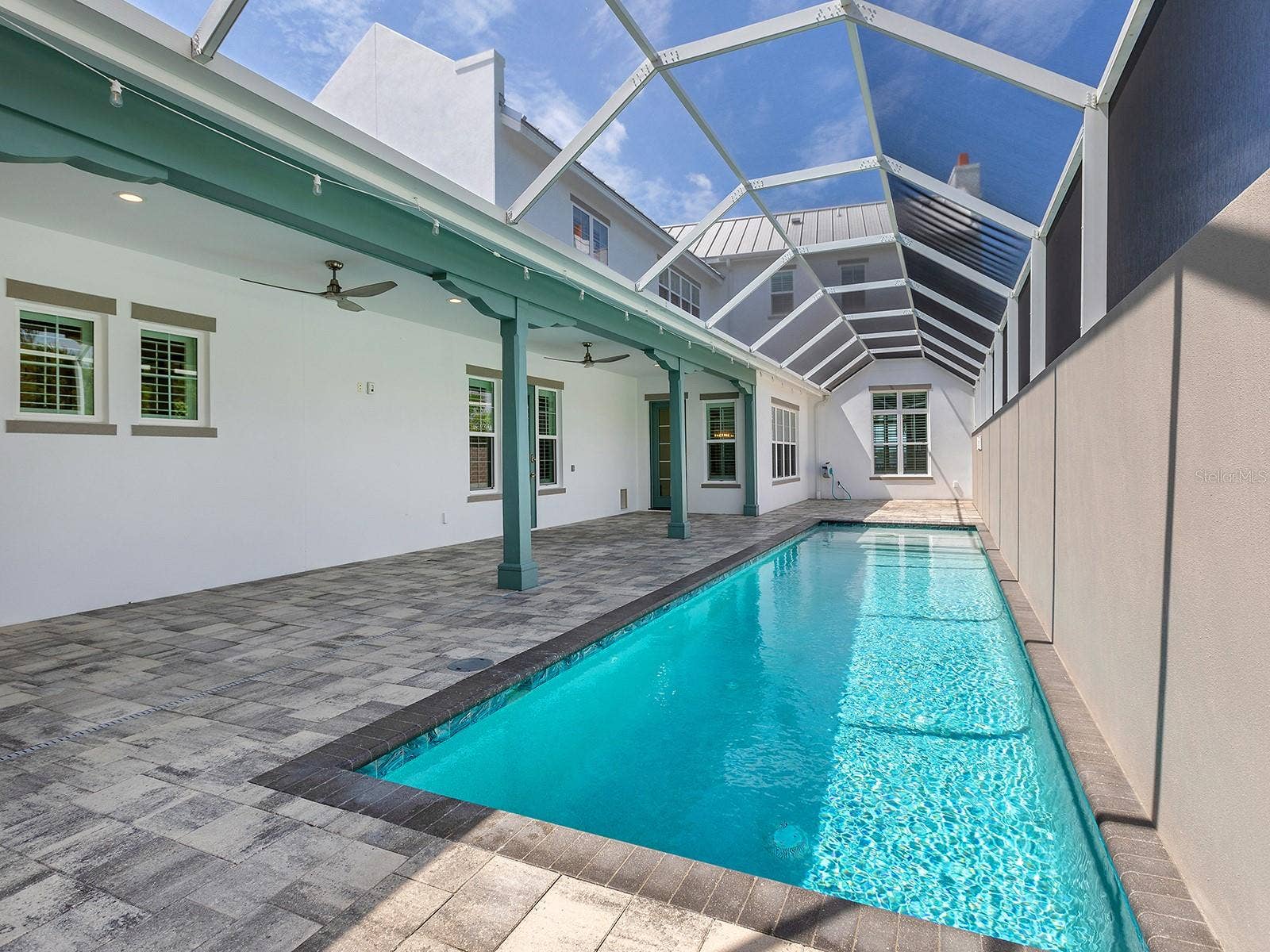 4024 11TH STREET COURT W, Palmetto, FL 34221 Above the 38-foot heated saltwater pool is the nearly 800 square foot in-law suite