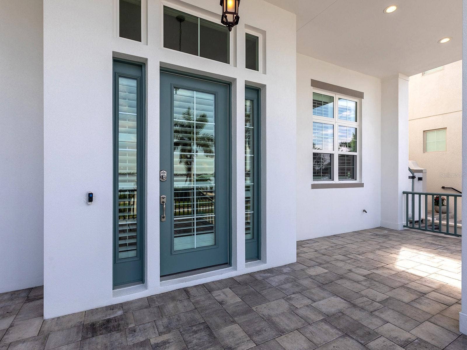 4024 11TH STREET COURT W, Palmetto, FL 34221 Walk from the river to your elevated 2021-built Palmetto dream home with a covered porch