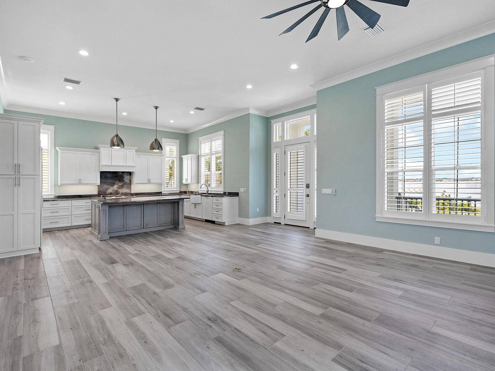 4024 11TH STREET COURT W, Palmetto, FL 34221 View from the family room towards the kitchen and front door