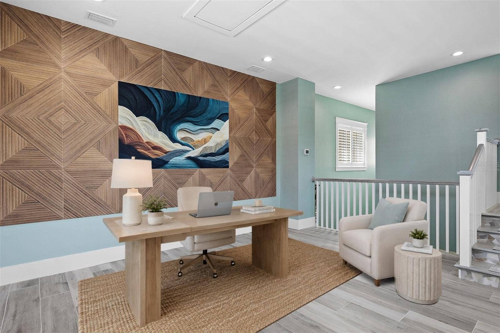 4024 11TH STREET COURT W, Palmetto, FL 34221 Virtually staged second-floor study/den featuring a wood-accent wall, dedicated office space, and an open stair landing