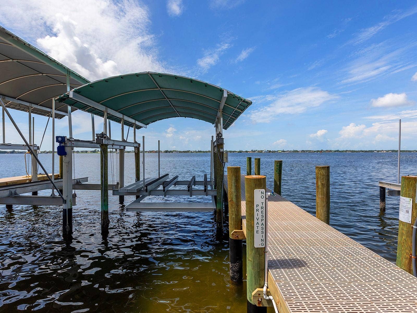 4024 11TH STREET COURT W, Palmetto, FL 34221 New surge-proof composite dock beside 2026 seawall