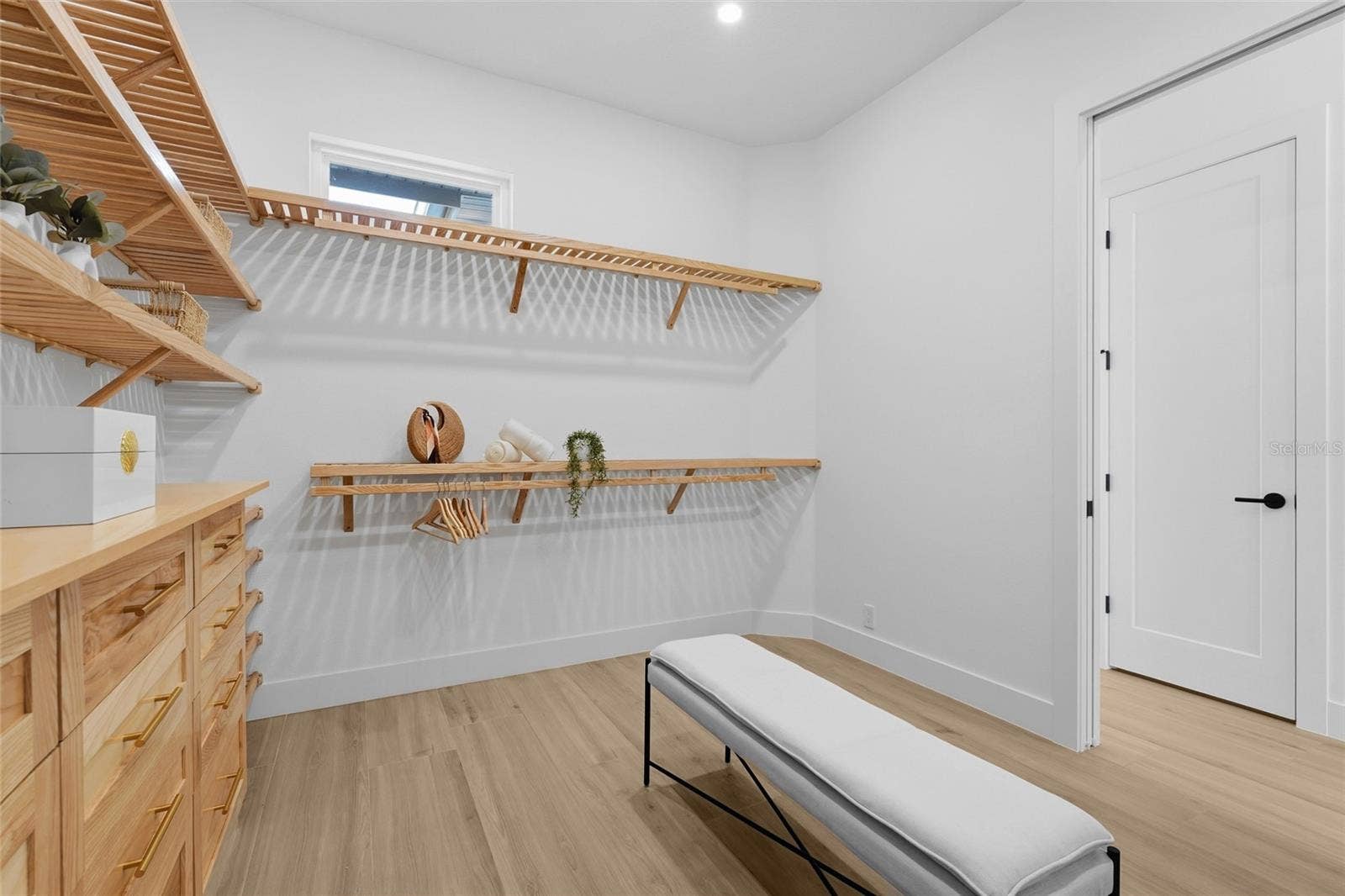7310 201ST STREET E, Bradenton, FL 34202 Primary suite walk-in closet