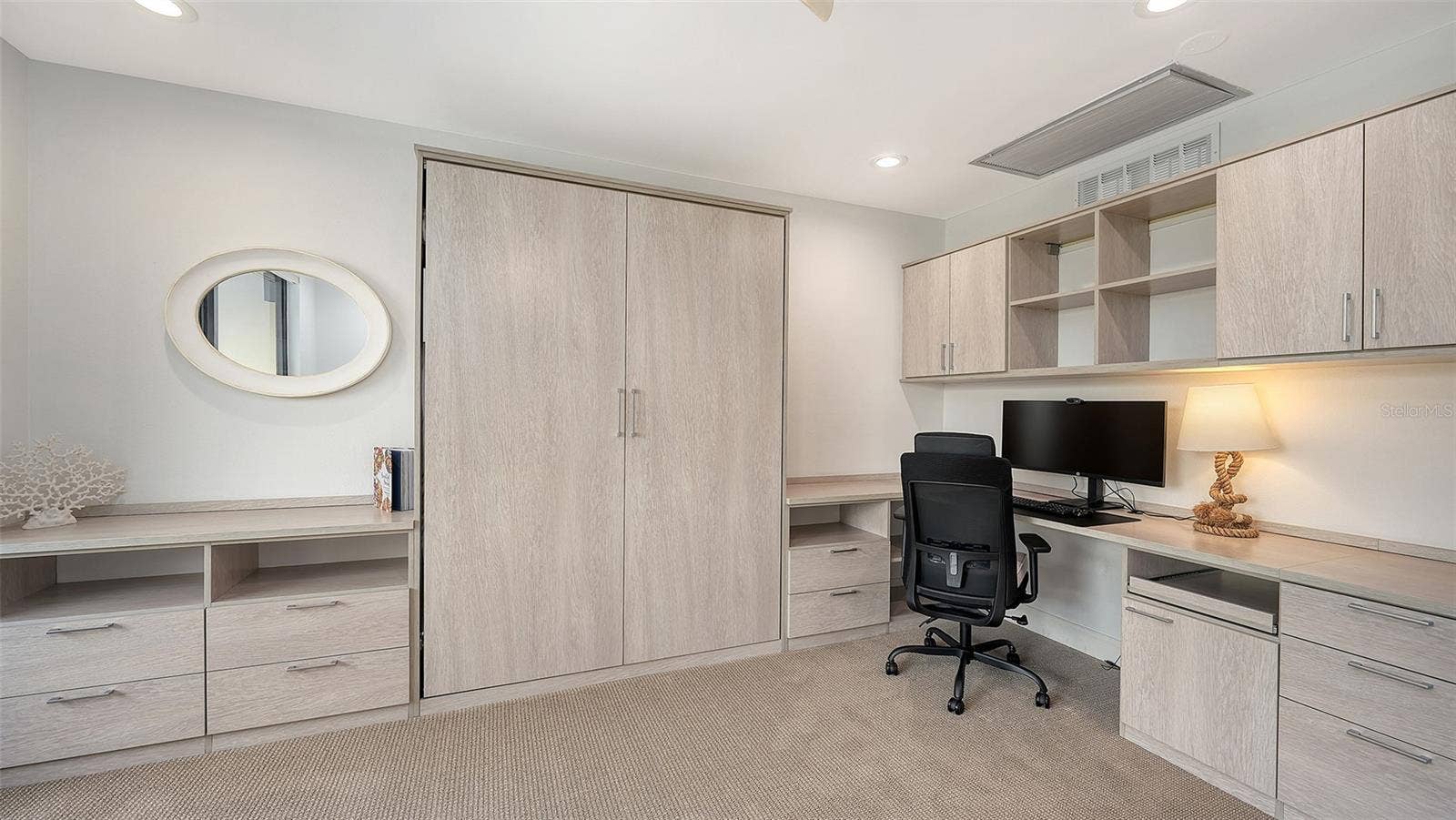4TH BEDROOM/ OFFICE HAS GREAT SHELVING & A QUEEN MURPHY BED